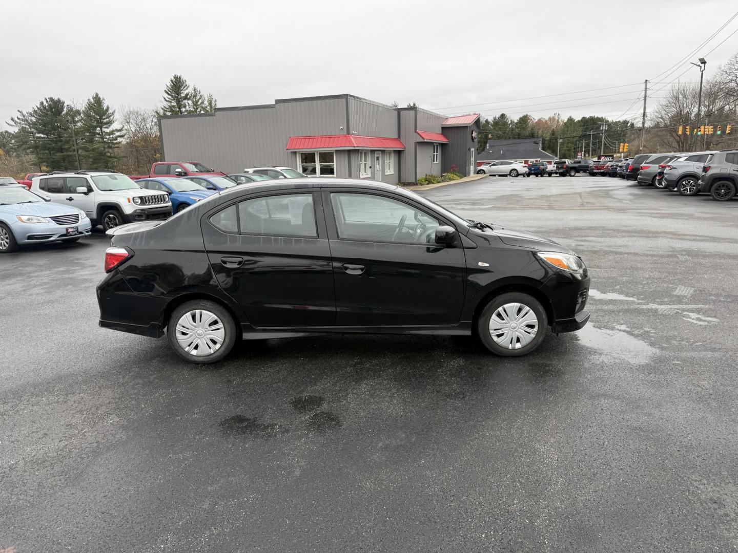 2021 Black /Black Mitsubishi Mirage G4 ES Auto (ML32FUFJ6MH) with an 1.2L I3 DOHC engine, Automatic transmission, located at 11115 Chardon Rd. , Chardon, OH, 44024, (440) 214-9705, 41.580246, -81.241943 - 2021 Mitsubishi Mirage G4 ES – Efficient, Compact, and Packed with Safety Features Discover an affordable and reliable ride with this 2021 Mitsubishi Mirage G4 ES. Powered by a fuel-efficient 1.2L I3 engine and equipped with Sport Mode, this sedan delivers an impressive 37 MPG combined and 41 M - Photo#5
