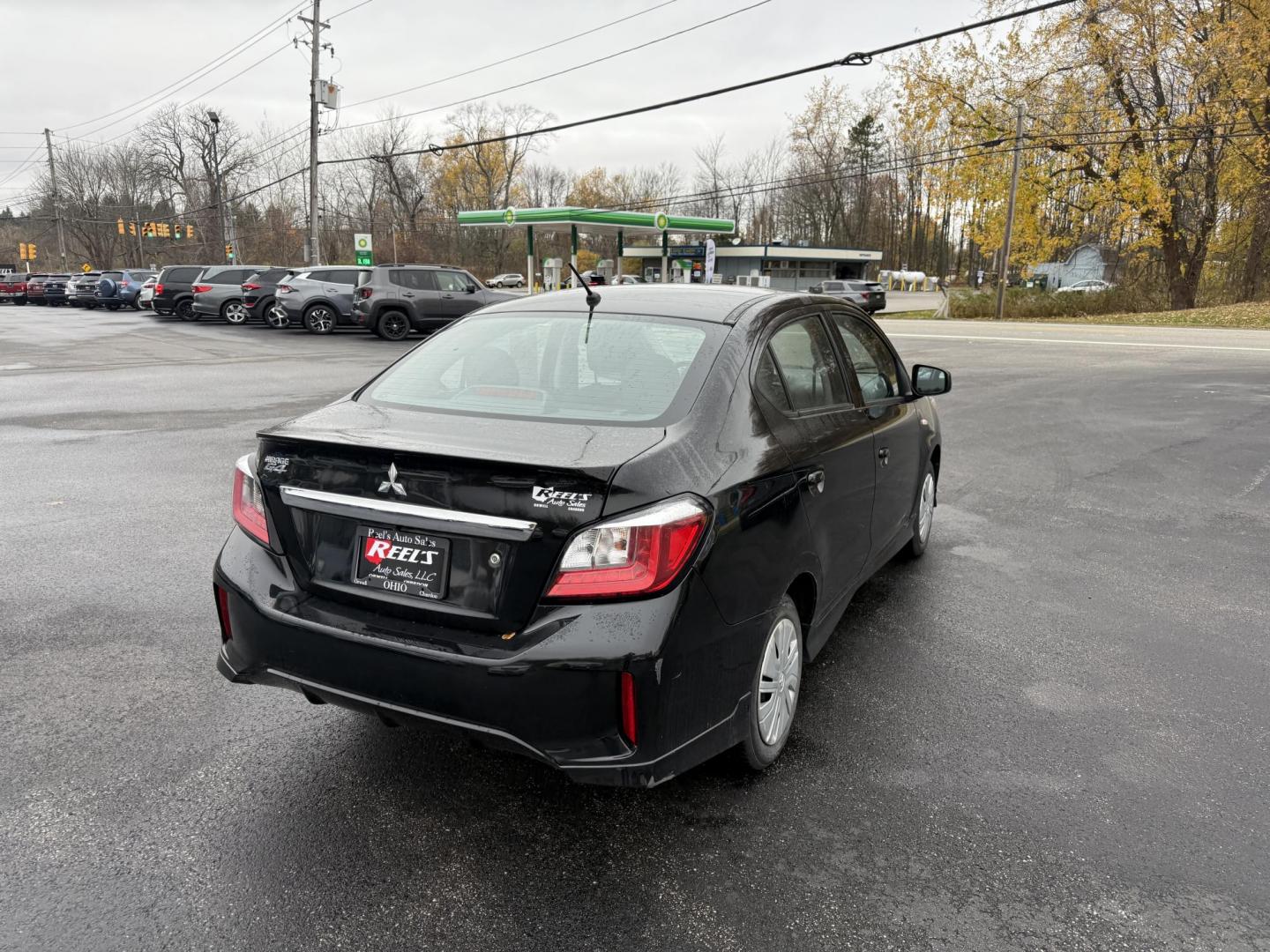 2021 Black /Black Mitsubishi Mirage G4 ES Auto (ML32FUFJ6MH) with an 1.2L I3 DOHC engine, Automatic transmission, located at 11115 Chardon Rd. , Chardon, OH, 44024, (440) 214-9705, 41.580246, -81.241943 - 2021 Mitsubishi Mirage G4 ES – Efficient, Compact, and Packed with Safety Features Discover an affordable and reliable ride with this 2021 Mitsubishi Mirage G4 ES. Powered by a fuel-efficient 1.2L I3 engine and equipped with Sport Mode, this sedan delivers an impressive 37 MPG combined and 41 M - Photo#7