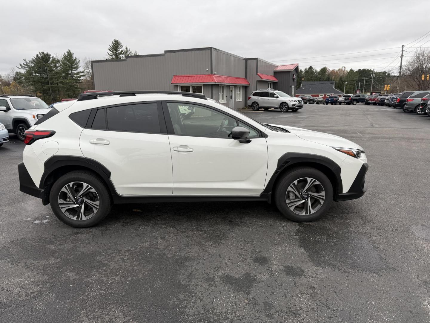 2024 White /Black Subaru Crosstrek 2.0i Premium CVT (JF2GUADC7RH) with an 2.0L I4 DOHC 16V engine, Automatic transmission, located at 11115 Chardon Rd. , Chardon, OH, 44024, (440) 214-9705, 41.580246, -81.241943 - One Owner – 2024 Subaru Crosstrek Premium – Adventure-Ready, Fuel-Efficient, and Loaded with Tech Discover the perfect blend of capability, comfort, and modern technology with this 2024 Subaru Crosstrek Premium. Powered by a lively 2.0L H4 engine and equipped with Subaru’s symmetrical AWD s - Photo#5