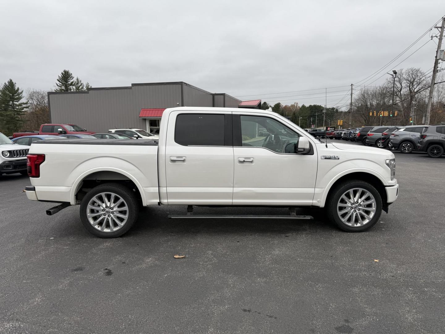 2018 White /Blue Ford F-150 Limited SuperCrew 5.5-ft. Bed 4WD (1FTEW1EG0JF) with an 3.5L V6 Twin Turbo engine, Automatic transmission, located at 11115 Chardon Rd. , Chardon, OH, 44024, (440) 214-9705, 41.580246, -81.241943 - 2018 Ford F-150 Limited Crew Cab 4WD – Luxury, Power, and Unmatched Capability Experience the ultimate in pickup truck luxury and performance with this 2018 Ford F-150 Limited Crew Cab 4WD. Powered by a robust 3.5L Twin Turbo EcoBoost V6 engine and paired with a 10-speed automatic transmission, - Photo#6
