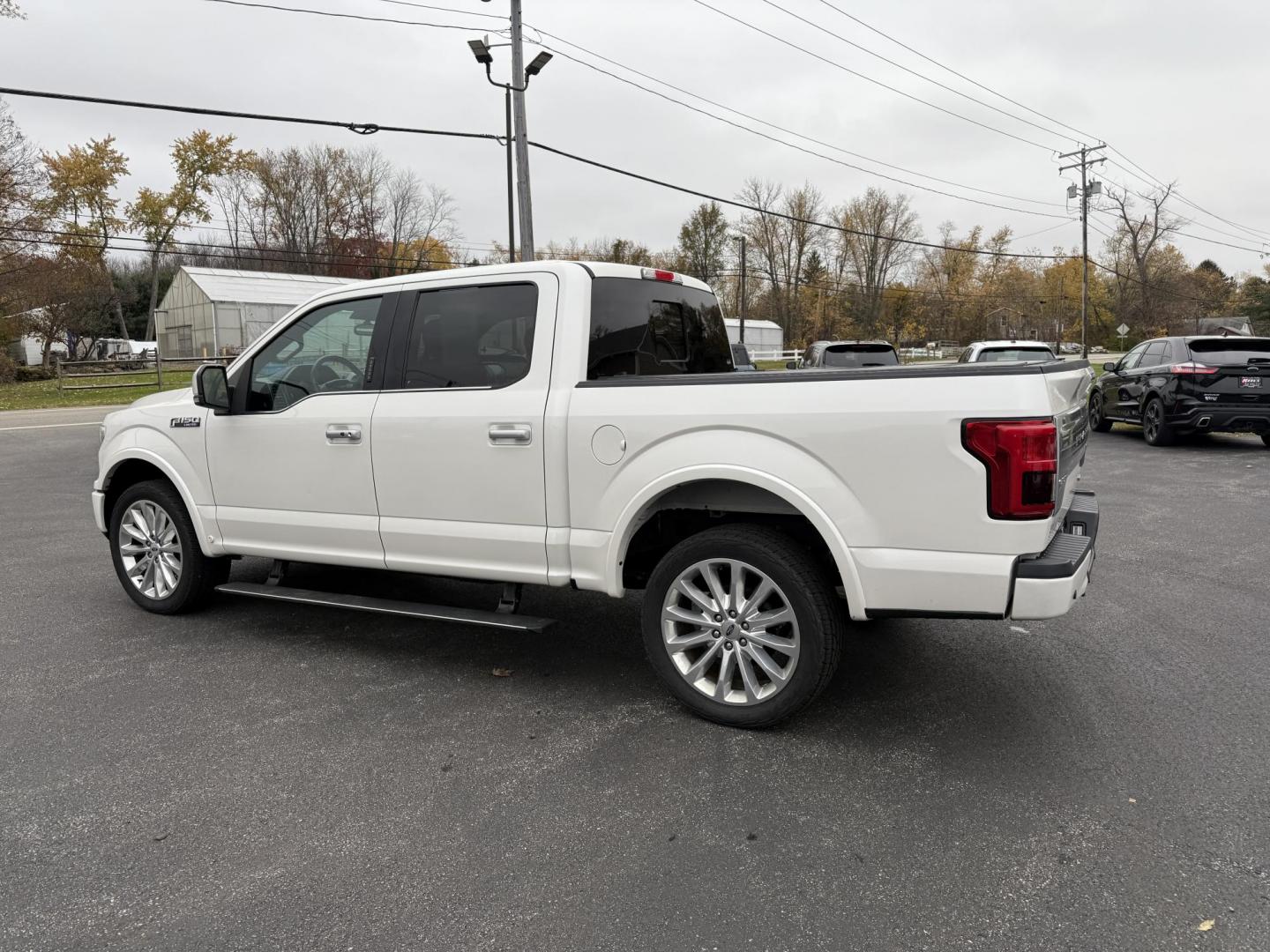 2018 White /Blue Ford F-150 Limited SuperCrew 5.5-ft. Bed 4WD (1FTEW1EG0JF) with an 3.5L V6 Twin Turbo engine, Automatic transmission, located at 11115 Chardon Rd. , Chardon, OH, 44024, (440) 214-9705, 41.580246, -81.241943 - 2018 Ford F-150 Limited Crew Cab 4WD – Luxury, Power, and Unmatched Capability Experience the ultimate in pickup truck luxury and performance with this 2018 Ford F-150 Limited Crew Cab 4WD. Powered by a robust 3.5L Twin Turbo EcoBoost V6 engine and paired with a 10-speed automatic transmission, - Photo#13