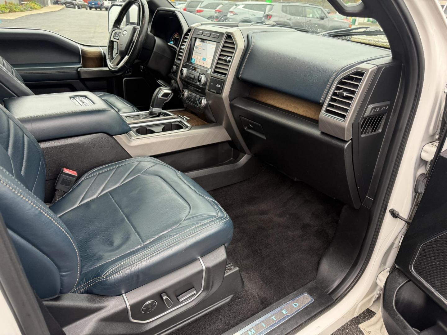 2018 White /Blue Ford F-150 Limited SuperCrew 5.5-ft. Bed 4WD (1FTEW1EG0JF) with an 3.5L V6 Twin Turbo engine, Automatic transmission, located at 11115 Chardon Rd. , Chardon, OH, 44024, (440) 214-9705, 41.580246, -81.241943 - 2018 Ford F-150 Limited Crew Cab 4WD – Luxury, Power, and Unmatched Capability Experience the ultimate in pickup truck luxury and performance with this 2018 Ford F-150 Limited Crew Cab 4WD. Powered by a robust 3.5L Twin Turbo EcoBoost V6 engine and paired with a 10-speed automatic transmission, - Photo#58