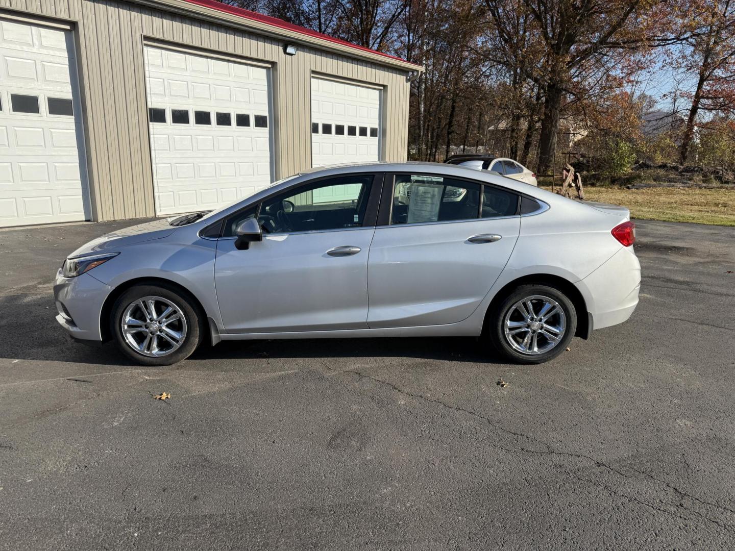 2016 Silver /Black Chevrolet Cruze LT Auto (1G1BE5SM8G7) with an 1.4L I4 DOHC 16V TURBO engine, Automatic transmission, located at 547 E. Main St., Orwell, OH, 44076, (440) 437-5893, 41.535435, -80.847855 - 2016 Chevrolet Cruze LT – Efficient, Comfortable, and Loaded with Features Drive smart and save big with this 2016 Chevrolet Cruze LT. Powered by a fuel-efficient 1.4L Turbocharged EcoTec I4 engine paired with a smooth 6-speed automatic transmission, this sedan delivers an impressive 34 MPG com - Photo#12
