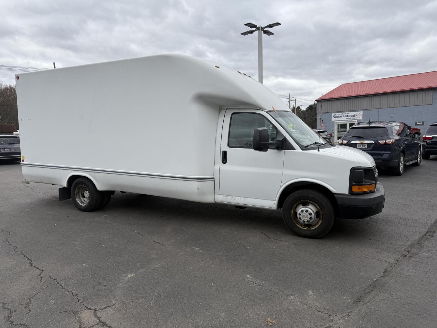 2015 White /Gray Chevrolet Express G3500 (1GB3G4CG0F1) with an 6.0L V8 OHV 16V FFV engine, 6A transmission, located at 11115 Chardon Rd. , Chardon, OH, 44024, (440) 214-9705, 41.580246, -81.241943 - ONE OWNER – 2015 Chevrolet Express 3500 Box Truck – Heavy-Duty Workhorse with Towing and Payload Power Get the job done with confidence in this rugged 2015 Chevrolet Express 3500 Box Truck. Powered by a reliable 6.0L Vortec V8 engine and paired with a smooth 6-speed automatic transmission, th - Photo#3