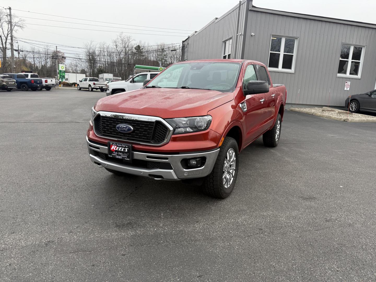 2019 Red /Black Ford Ranger XLT SuperCrew 4WD (1FTER4FH1KL) with an 2.3L I4 DOHC 16V Turbo engine, Automatic transmission, located at 11115 Chardon Rd. , Chardon, OH, 44024, (440) 214-9705, 41.580246, -81.241943 - One Owner – 2019 Ford Ranger XLT Crew Cab 4WD – Rugged Capability, Modern Technology, and Off-Road Adventure Ready Conquer any terrain with confidence in this 2019 Ford Ranger XLT Crew Cab 4WD. Powered by a responsive 2.3L Turbocharged EcoBoost I4 engine and paired with a 10-speed automatic t - Photo#0