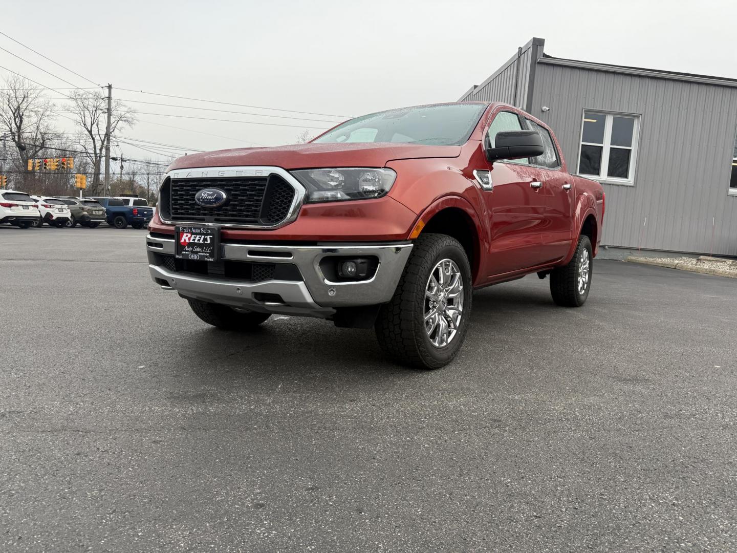 2019 Red /Black Ford Ranger XLT SuperCrew 4WD (1FTER4FH1KL) with an 2.3L I4 DOHC 16V Turbo engine, Automatic transmission, located at 11115 Chardon Rd. , Chardon, OH, 44024, (440) 214-9705, 41.580246, -81.241943 - One Owner – 2019 Ford Ranger XLT Crew Cab 4WD – Rugged Capability, Modern Technology, and Off-Road Adventure Ready Conquer any terrain with confidence in this 2019 Ford Ranger XLT Crew Cab 4WD. Powered by a responsive 2.3L Turbocharged EcoBoost I4 engine and paired with a 10-speed automatic t - Photo#1