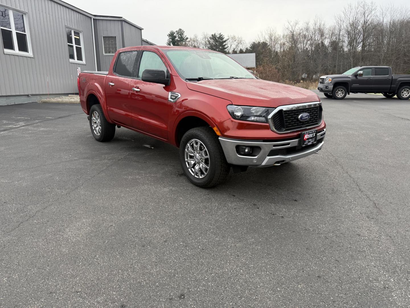 2019 Red /Black Ford Ranger XLT SuperCrew 4WD (1FTER4FH1KL) with an 2.3L I4 DOHC 16V Turbo engine, Automatic transmission, located at 11115 Chardon Rd. , Chardon, OH, 44024, (440) 214-9705, 41.580246, -81.241943 - One Owner – 2019 Ford Ranger XLT Crew Cab 4WD – Rugged Capability, Modern Technology, and Off-Road Adventure Ready Conquer any terrain with confidence in this 2019 Ford Ranger XLT Crew Cab 4WD. Powered by a responsive 2.3L Turbocharged EcoBoost I4 engine and paired with a 10-speed automatic t - Photo#3
