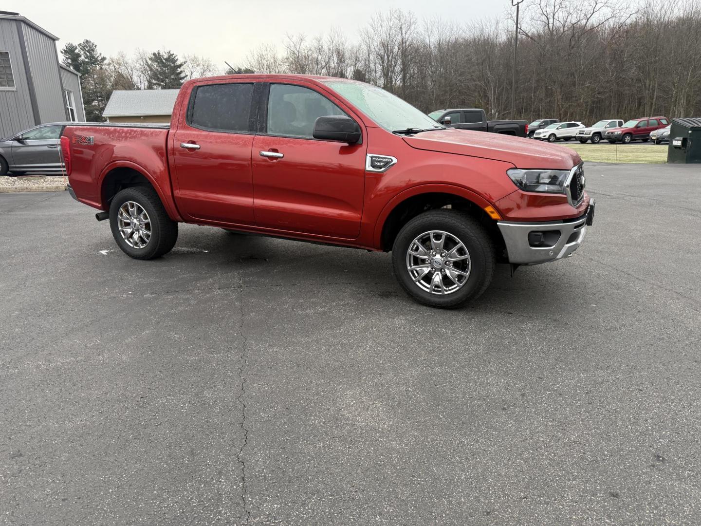 2019 Red /Black Ford Ranger XLT SuperCrew 4WD (1FTER4FH1KL) with an 2.3L I4 DOHC 16V Turbo engine, Automatic transmission, located at 11115 Chardon Rd. , Chardon, OH, 44024, (440) 214-9705, 41.580246, -81.241943 - One Owner – 2019 Ford Ranger XLT Crew Cab 4WD – Rugged Capability, Modern Technology, and Off-Road Adventure Ready Conquer any terrain with confidence in this 2019 Ford Ranger XLT Crew Cab 4WD. Powered by a responsive 2.3L Turbocharged EcoBoost I4 engine and paired with a 10-speed automatic t - Photo#4