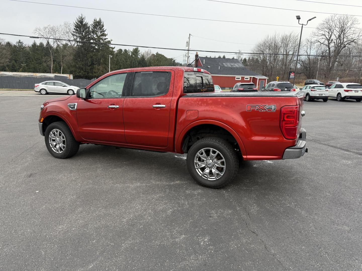 2019 Red /Black Ford Ranger XLT SuperCrew 4WD (1FTER4FH1KL) with an 2.3L I4 DOHC 16V Turbo engine, Automatic transmission, located at 11115 Chardon Rd. , Chardon, OH, 44024, (440) 214-9705, 41.580246, -81.241943 - One Owner – 2019 Ford Ranger XLT Crew Cab 4WD – Rugged Capability, Modern Technology, and Off-Road Adventure Ready Conquer any terrain with confidence in this 2019 Ford Ranger XLT Crew Cab 4WD. Powered by a responsive 2.3L Turbocharged EcoBoost I4 engine and paired with a 10-speed automatic t - Photo#12