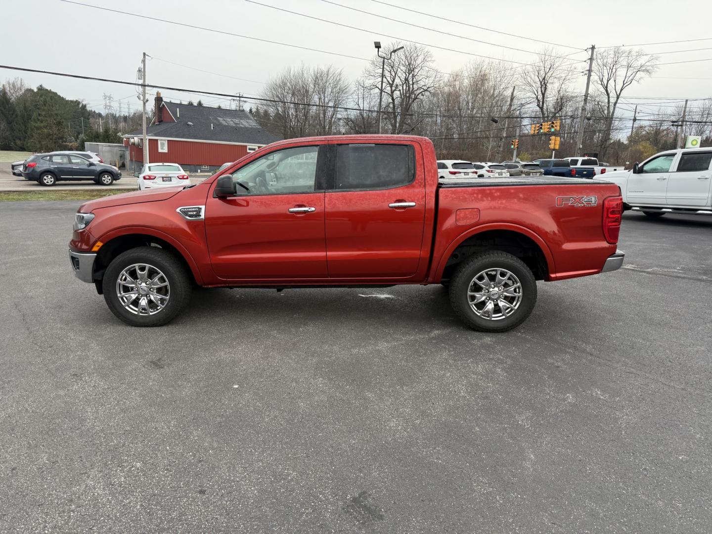 2019 Red /Black Ford Ranger XLT SuperCrew 4WD (1FTER4FH1KL) with an 2.3L I4 DOHC 16V Turbo engine, Automatic transmission, located at 11115 Chardon Rd. , Chardon, OH, 44024, (440) 214-9705, 41.580246, -81.241943 - One Owner – 2019 Ford Ranger XLT Crew Cab 4WD – Rugged Capability, Modern Technology, and Off-Road Adventure Ready Conquer any terrain with confidence in this 2019 Ford Ranger XLT Crew Cab 4WD. Powered by a responsive 2.3L Turbocharged EcoBoost I4 engine and paired with a 10-speed automatic t - Photo#14