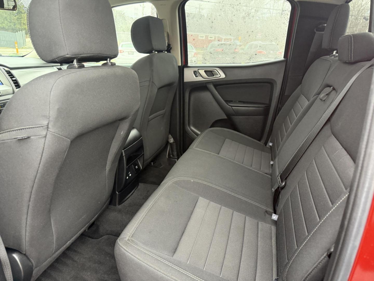 2019 Red /Black Ford Ranger XLT SuperCrew 4WD (1FTER4FH1KL) with an 2.3L I4 DOHC 16V Turbo engine, Automatic transmission, located at 11115 Chardon Rd. , Chardon, OH, 44024, (440) 214-9705, 41.580246, -81.241943 - One Owner – 2019 Ford Ranger XLT Crew Cab 4WD – Rugged Capability, Modern Technology, and Off-Road Adventure Ready Conquer any terrain with confidence in this 2019 Ford Ranger XLT Crew Cab 4WD. Powered by a responsive 2.3L Turbocharged EcoBoost I4 engine and paired with a 10-speed automatic t - Photo#38