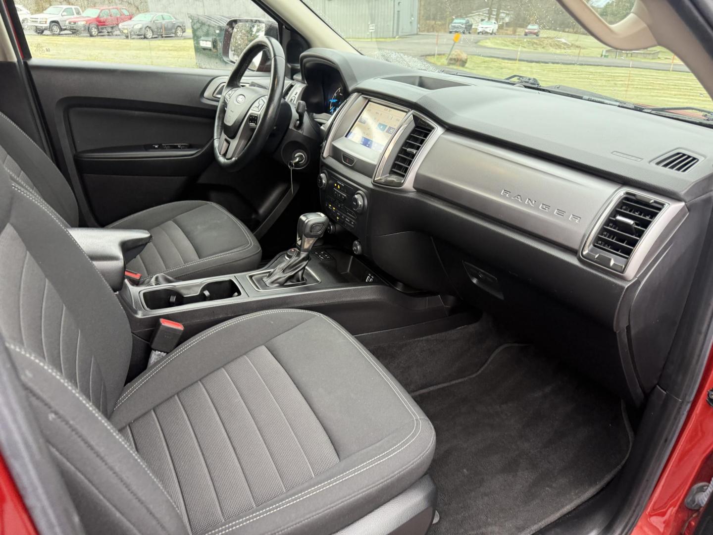 2019 Red /Black Ford Ranger XLT SuperCrew 4WD (1FTER4FH1KL) with an 2.3L I4 DOHC 16V Turbo engine, Automatic transmission, located at 11115 Chardon Rd. , Chardon, OH, 44024, (440) 214-9705, 41.580246, -81.241943 - One Owner – 2019 Ford Ranger XLT Crew Cab 4WD – Rugged Capability, Modern Technology, and Off-Road Adventure Ready Conquer any terrain with confidence in this 2019 Ford Ranger XLT Crew Cab 4WD. Powered by a responsive 2.3L Turbocharged EcoBoost I4 engine and paired with a 10-speed automatic t - Photo#44