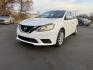 2019 White /Black Nissan Sentra S CVT (3N1AB7AP8KY) with an 1.8L I4 SFI DOHC 16V engine, Automatic transmission, located at 547 E. Main St., Orwell, OH, 44076, (440) 437-5893, 41.535435, -80.847855 - 2019 Nissan Sentra S – Efficient, Safe, and Smartly Equipped Enjoy reliability and impressive efficiency in this 2019 Nissan Sentra S. Powered by a fuel-sipping 1.8L I4 engine with ECO mode, this sedan delivers an outstanding 32 MPG combined and up to 37 MPG highway—making it the ideal choice - Photo#0