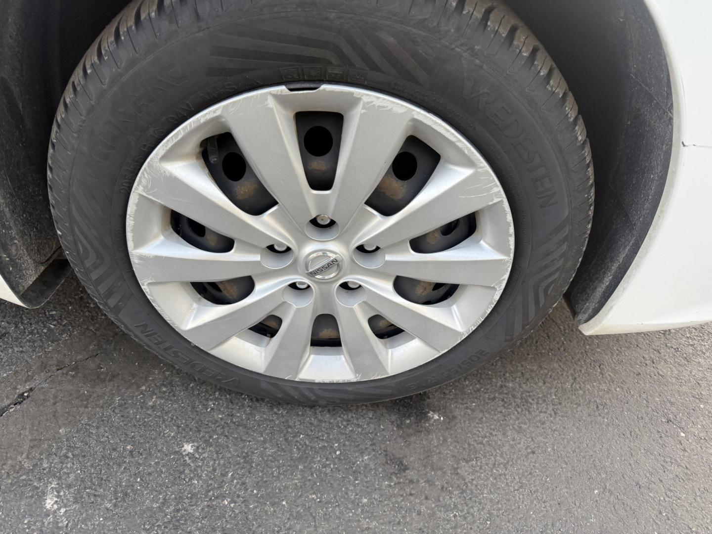 2019 White /Black Nissan Sentra S CVT (3N1AB7AP8KY) with an 1.8L I4 SFI DOHC 16V engine, Automatic transmission, located at 547 E. Main St., Orwell, OH, 44076, (440) 437-5893, 41.535435, -80.847855 - 2019 Nissan Sentra S – Efficient, Safe, and Smartly Equipped Enjoy reliability and impressive efficiency in this 2019 Nissan Sentra S. Powered by a fuel-sipping 1.8L I4 engine with ECO mode, this sedan delivers an outstanding 32 MPG combined and up to 37 MPG highway—making it the ideal choice - Photo#4