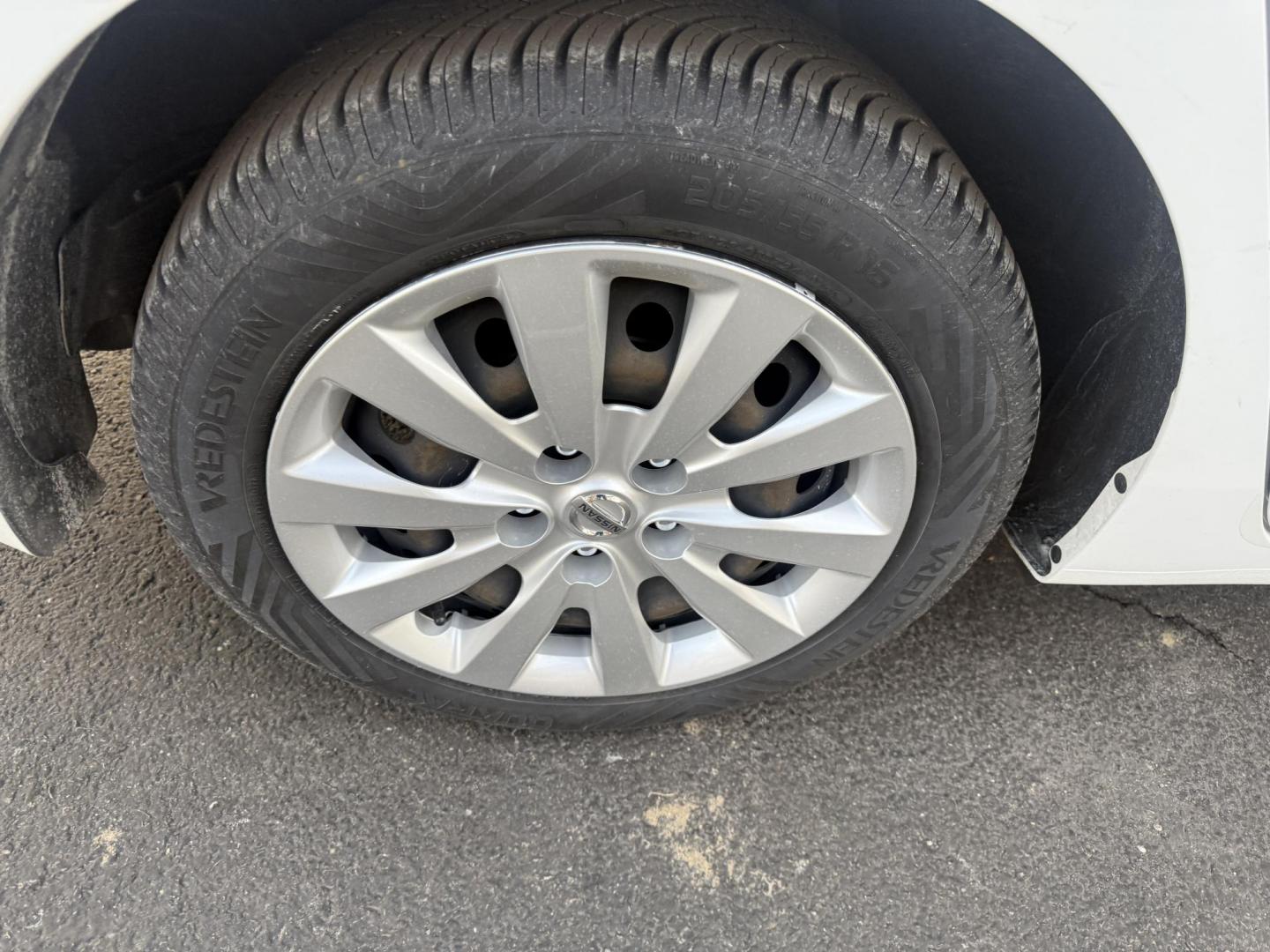 2019 White /Black Nissan Sentra S CVT (3N1AB7AP8KY) with an 1.8L I4 SFI DOHC 16V engine, Automatic transmission, located at 547 E. Main St., Orwell, OH, 44076, (440) 437-5893, 41.535435, -80.847855 - 2019 Nissan Sentra S – Efficient, Safe, and Smartly Equipped Enjoy reliability and impressive efficiency in this 2019 Nissan Sentra S. Powered by a fuel-sipping 1.8L I4 engine with ECO mode, this sedan delivers an outstanding 32 MPG combined and up to 37 MPG highway—making it the ideal choice - Photo#6