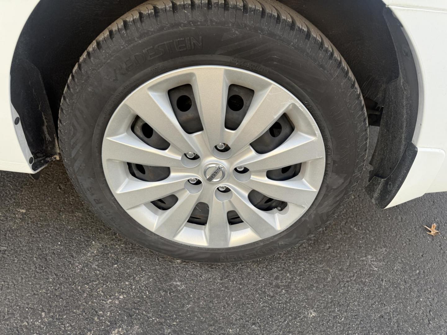 2019 White /Black Nissan Sentra S CVT (3N1AB7AP8KY) with an 1.8L I4 SFI DOHC 16V engine, Automatic transmission, located at 547 E. Main St., Orwell, OH, 44076, (440) 437-5893, 41.535435, -80.847855 - 2019 Nissan Sentra S – Efficient, Safe, and Smartly Equipped Enjoy reliability and impressive efficiency in this 2019 Nissan Sentra S. Powered by a fuel-sipping 1.8L I4 engine with ECO mode, this sedan delivers an outstanding 32 MPG combined and up to 37 MPG highway—making it the ideal choice - Photo#11