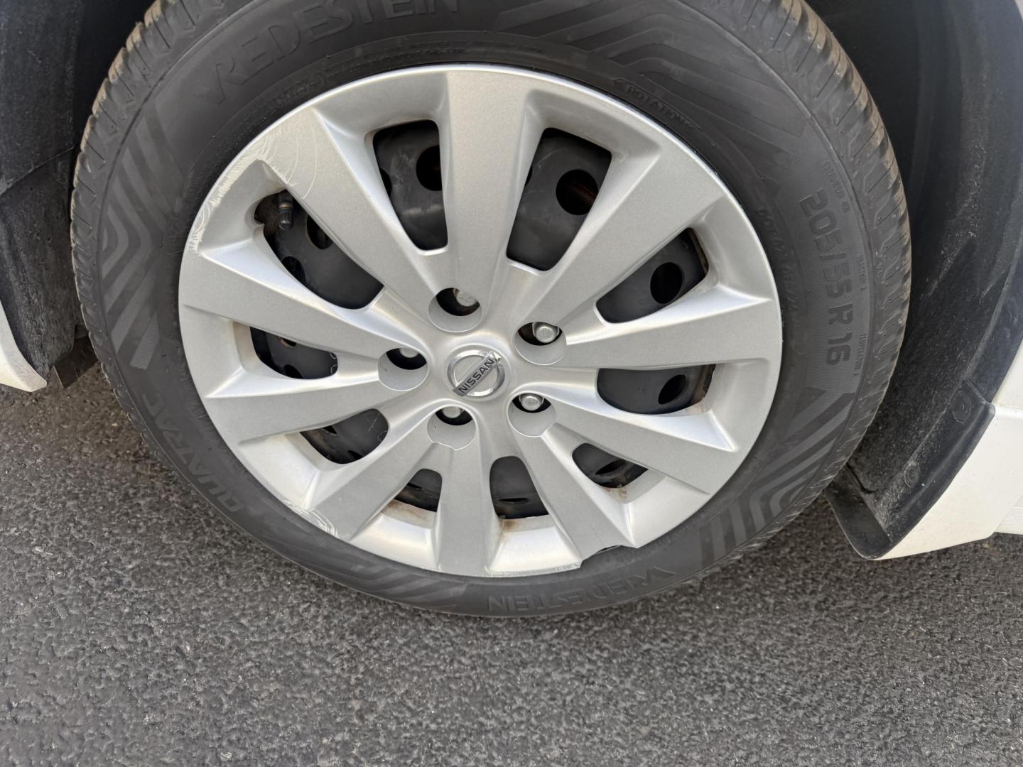 2019 White /Black Nissan Sentra S CVT (3N1AB7AP8KY) with an 1.8L I4 SFI DOHC 16V engine, Automatic transmission, located at 547 E. Main St., Orwell, OH, 44076, (440) 437-5893, 41.535435, -80.847855 - 2019 Nissan Sentra S – Efficient, Safe, and Smartly Equipped Enjoy reliability and impressive efficiency in this 2019 Nissan Sentra S. Powered by a fuel-sipping 1.8L I4 engine with ECO mode, this sedan delivers an outstanding 32 MPG combined and up to 37 MPG highway—making it the ideal choice - Photo#13