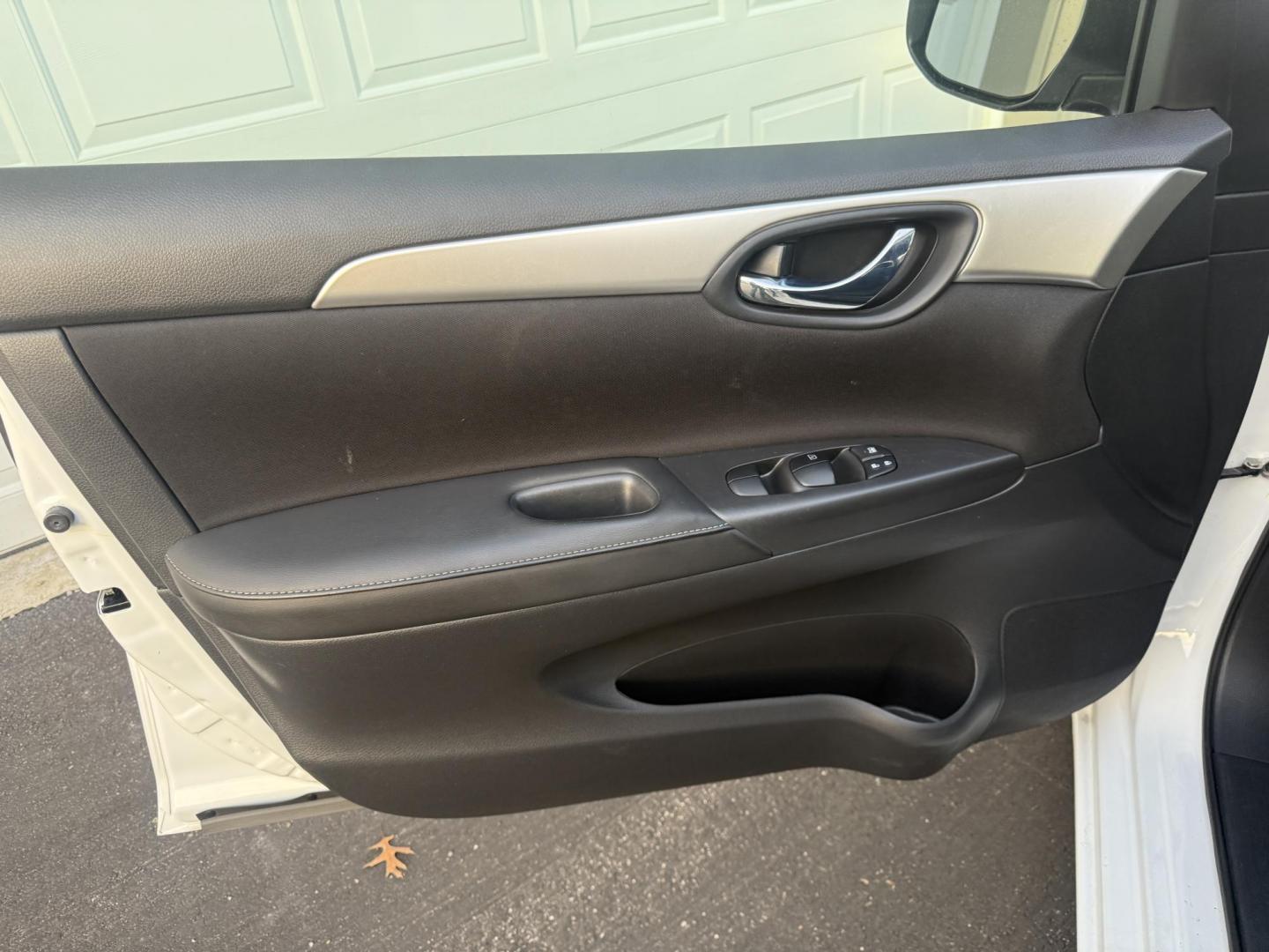 2019 White /Black Nissan Sentra S CVT (3N1AB7AP8KY) with an 1.8L I4 SFI DOHC 16V engine, Automatic transmission, located at 547 E. Main St., Orwell, OH, 44076, (440) 437-5893, 41.535435, -80.847855 - 2019 Nissan Sentra S – Efficient, Safe, and Smartly Equipped Enjoy reliability and impressive efficiency in this 2019 Nissan Sentra S. Powered by a fuel-sipping 1.8L I4 engine with ECO mode, this sedan delivers an outstanding 32 MPG combined and up to 37 MPG highway—making it the ideal choice - Photo#16