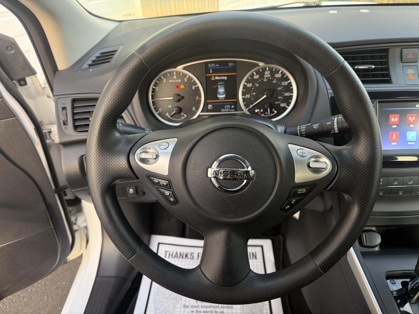 2019 White /Black Nissan Sentra S CVT (3N1AB7AP8KY) with an 1.8L I4 SFI DOHC 16V engine, Automatic transmission, located at 547 E. Main St., Orwell, OH, 44076, (440) 437-5893, 41.535435, -80.847855 - 2019 Nissan Sentra S – Efficient, Safe, and Smartly Equipped Enjoy reliability and impressive efficiency in this 2019 Nissan Sentra S. Powered by a fuel-sipping 1.8L I4 engine with ECO mode, this sedan delivers an outstanding 32 MPG combined and up to 37 MPG highway—making it the ideal choice - Photo#25