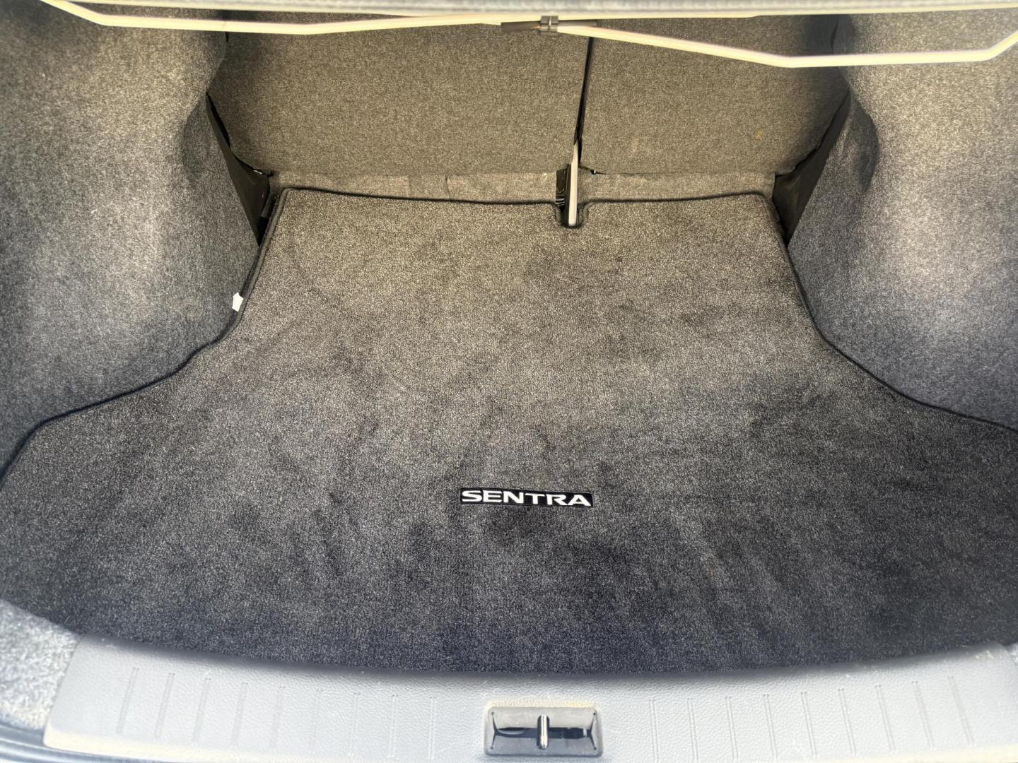 2019 White /Black Nissan Sentra S CVT (3N1AB7AP8KY) with an 1.8L I4 SFI DOHC 16V engine, Automatic transmission, located at 547 E. Main St., Orwell, OH, 44076, (440) 437-5893, 41.535435, -80.847855 - 2019 Nissan Sentra S – Efficient, Safe, and Smartly Equipped Enjoy reliability and impressive efficiency in this 2019 Nissan Sentra S. Powered by a fuel-sipping 1.8L I4 engine with ECO mode, this sedan delivers an outstanding 32 MPG combined and up to 37 MPG highway—making it the ideal choice - Photo#35