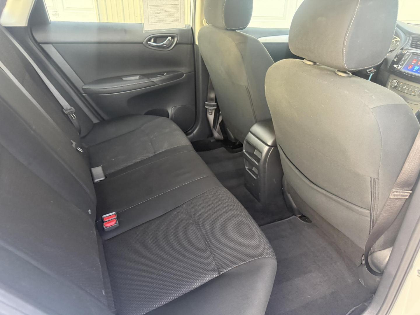 2019 White /Black Nissan Sentra S CVT (3N1AB7AP8KY) with an 1.8L I4 SFI DOHC 16V engine, Automatic transmission, located at 547 E. Main St., Orwell, OH, 44076, (440) 437-5893, 41.535435, -80.847855 - 2019 Nissan Sentra S – Efficient, Safe, and Smartly Equipped Enjoy reliability and impressive efficiency in this 2019 Nissan Sentra S. Powered by a fuel-sipping 1.8L I4 engine with ECO mode, this sedan delivers an outstanding 32 MPG combined and up to 37 MPG highway—making it the ideal choice - Photo#37