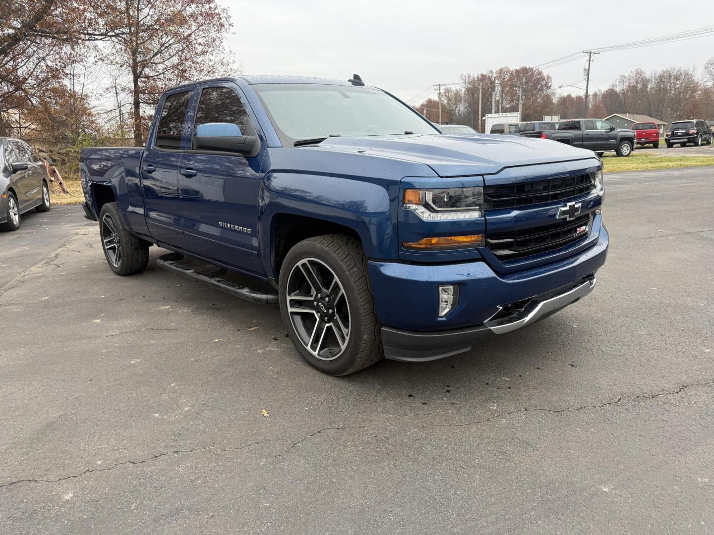 2018 Blue /Black Chevrolet Silverado 1500 LT Z71 Double Cab 4WD (1GCVKREC2JZ) with an 5.3L V8 OHV 16V engine, Automatic transmission, located at 547 E. Main St., Orwell, OH, 44076, (440) 437-5893, 41.535435, -80.847855 - 2018 Chevrolet Silverado 1500 LT Z71 Double Cab 4WD – Power, Luxury, and Off-Road Capability in One Bold Package Conquer any road or trail with this 2018 Chevrolet Silverado 1500 LT Z71 Double Cab 4WD. Under the hood, the formidable 5.3L EcoTec3 V8 engine pairs with a 6-speed automatic transmis - Photo#2