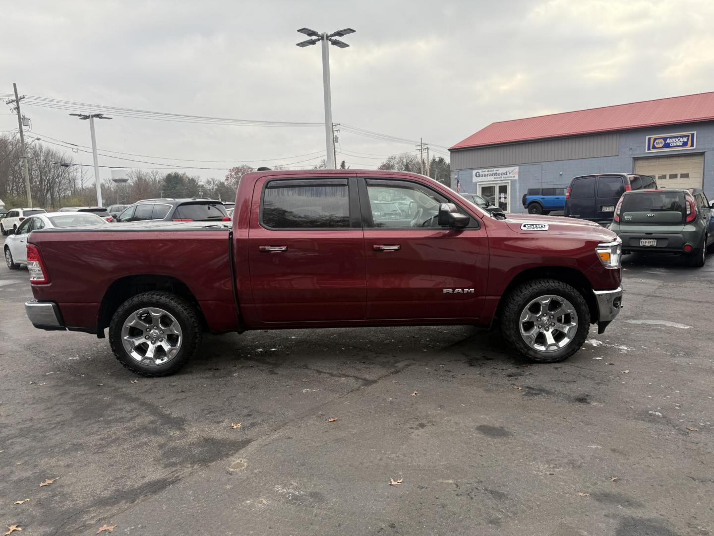 2019 Red /Black RAM 1500 Big Horn Crew Cab SWB 4WD (1C6SRFFT5KN) with an 5.7L V8 OHV 16V engine, Automatic transmission, located at 547 E. Main St., Orwell, OH, 44076, (440) 437-5893, 41.535435, -80.847855 - 2019 Ram 1500 Big Horn Crew Cab 4WD – Bold Power, Premium Comfort, and Rugged Capability Take command of the road with this 2019 Ram 1500 Big Horn Crew Cab 4WD. Powered by the legendary 5.7L HEMI V8 engine delivering 395 horsepower and 410 lb-ft of torque, this truck is built to tackle any task - Photo#6