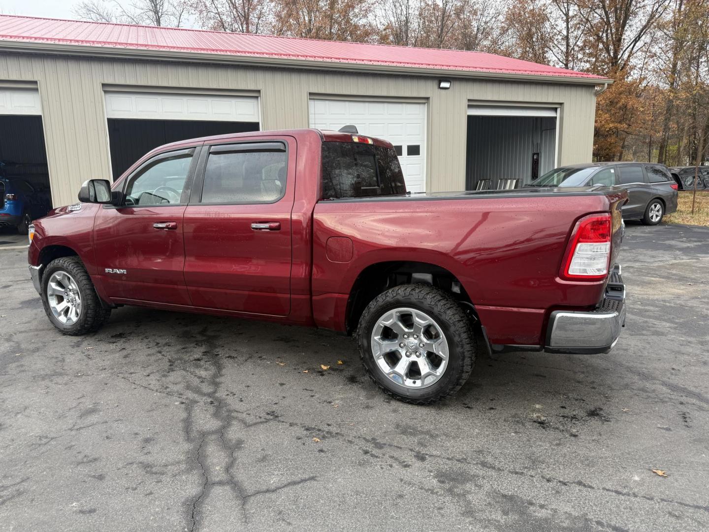 2019 Red /Black RAM 1500 Big Horn Crew Cab SWB 4WD (1C6SRFFT5KN) with an 5.7L V8 OHV 16V engine, Automatic transmission, located at 547 E. Main St., Orwell, OH, 44076, (440) 437-5893, 41.535435, -80.847855 - 2019 Ram 1500 Big Horn Crew Cab 4WD – Bold Power, Premium Comfort, and Rugged Capability Take command of the road with this 2019 Ram 1500 Big Horn Crew Cab 4WD. Powered by the legendary 5.7L HEMI V8 engine delivering 395 horsepower and 410 lb-ft of torque, this truck is built to tackle any task - Photo#12