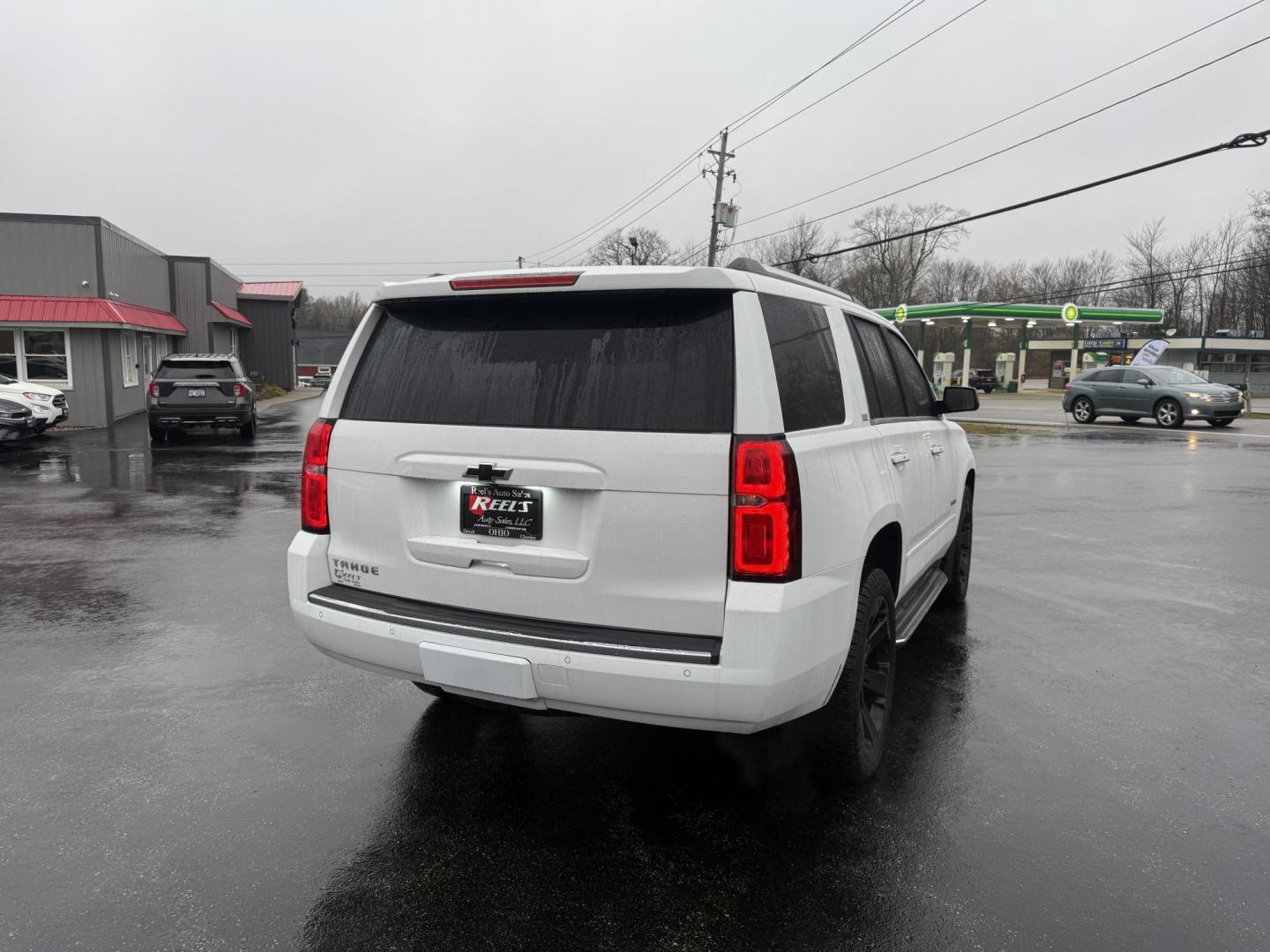 2015 White /Black Chevrolet Tahoe LTZ 4WD (1GNSKCKC8FR) with an 5.3L V8 OHV 16V engine, 6-Speed Automatic transmission, located at 11115 Chardon Rd. , Chardon, OH, 44024, (440) 214-9705, 41.580246, -81.241943 - 2015 Chevrolet Tahoe LTZ 4WD – Full-Size Luxury, Advanced Safety, and Unmatched Versatility Experience the ultimate in comfort, capability, and technology with this 2015 Chevrolet Tahoe LTZ 4WD. Powered by a robust 5.3L EcoTec3 V8 engine paired with a 6-speed automatic transmission and 3.23 gea - Photo#7