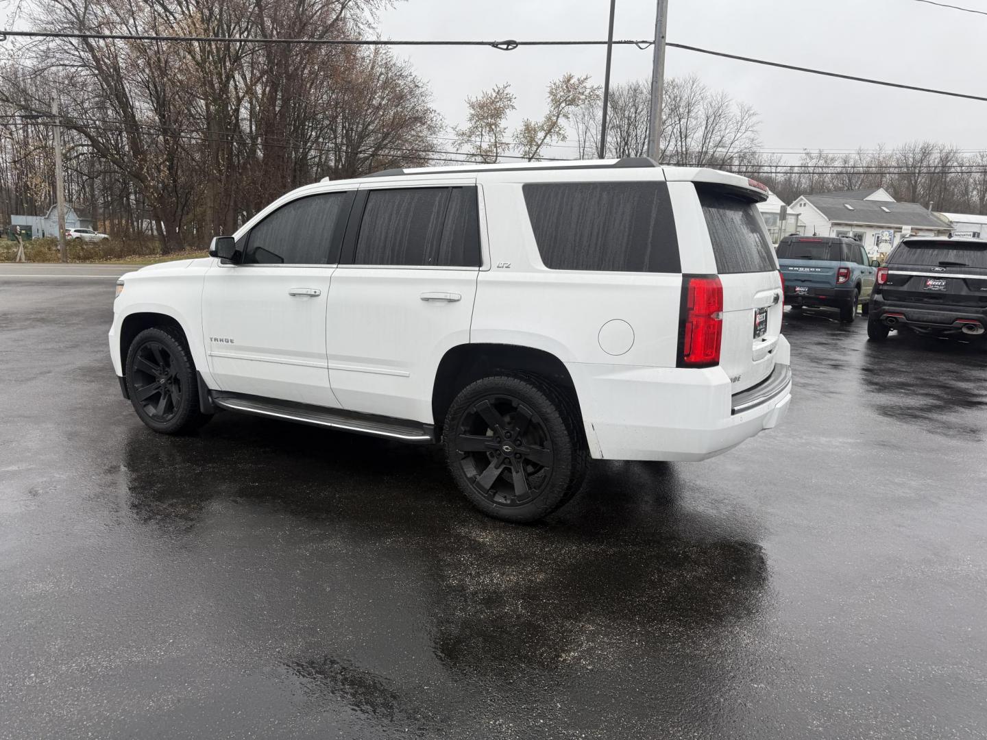 2015 White /Black Chevrolet Tahoe LTZ 4WD (1GNSKCKC8FR) with an 5.3L V8 OHV 16V engine, 6-Speed Automatic transmission, located at 11115 Chardon Rd. , Chardon, OH, 44024, (440) 214-9705, 41.580246, -81.241943 - 2015 Chevrolet Tahoe LTZ 4WD – Full-Size Luxury, Advanced Safety, and Unmatched Versatility Experience the ultimate in comfort, capability, and technology with this 2015 Chevrolet Tahoe LTZ 4WD. Powered by a robust 5.3L EcoTec3 V8 engine paired with a 6-speed automatic transmission and 3.23 gea - Photo#10