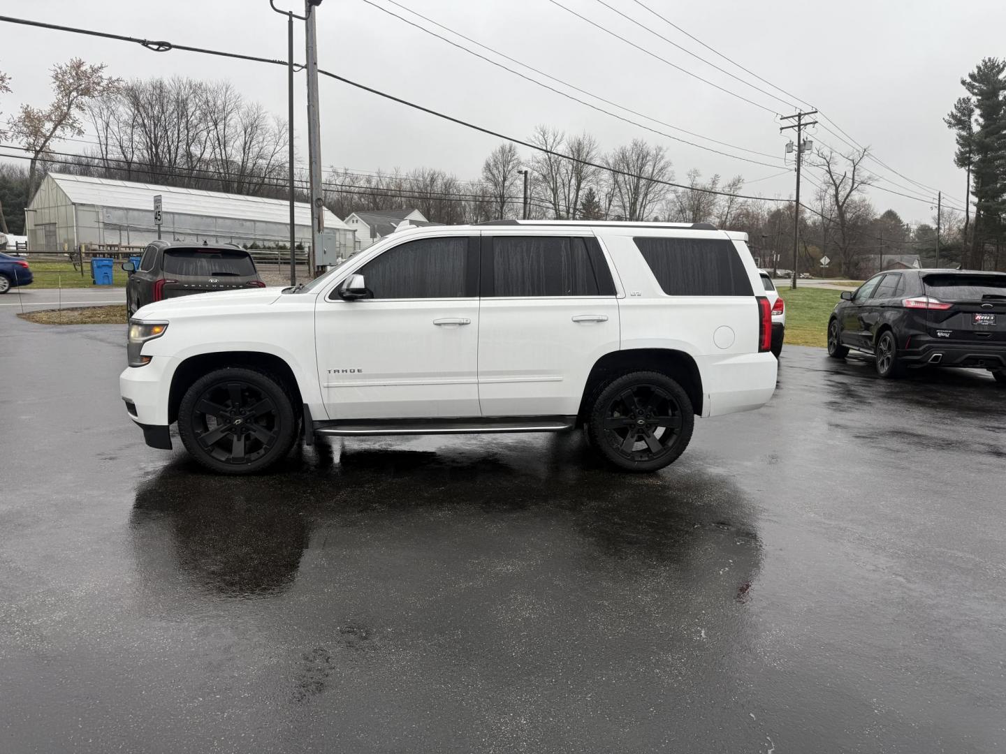 2015 White /Black Chevrolet Tahoe LTZ 4WD (1GNSKCKC8FR) with an 5.3L V8 OHV 16V engine, 6-Speed Automatic transmission, located at 11115 Chardon Rd. , Chardon, OH, 44024, (440) 214-9705, 41.580246, -81.241943 - 2015 Chevrolet Tahoe LTZ 4WD – Full-Size Luxury, Advanced Safety, and Unmatched Versatility Experience the ultimate in comfort, capability, and technology with this 2015 Chevrolet Tahoe LTZ 4WD. Powered by a robust 5.3L EcoTec3 V8 engine paired with a 6-speed automatic transmission and 3.23 gea - Photo#12