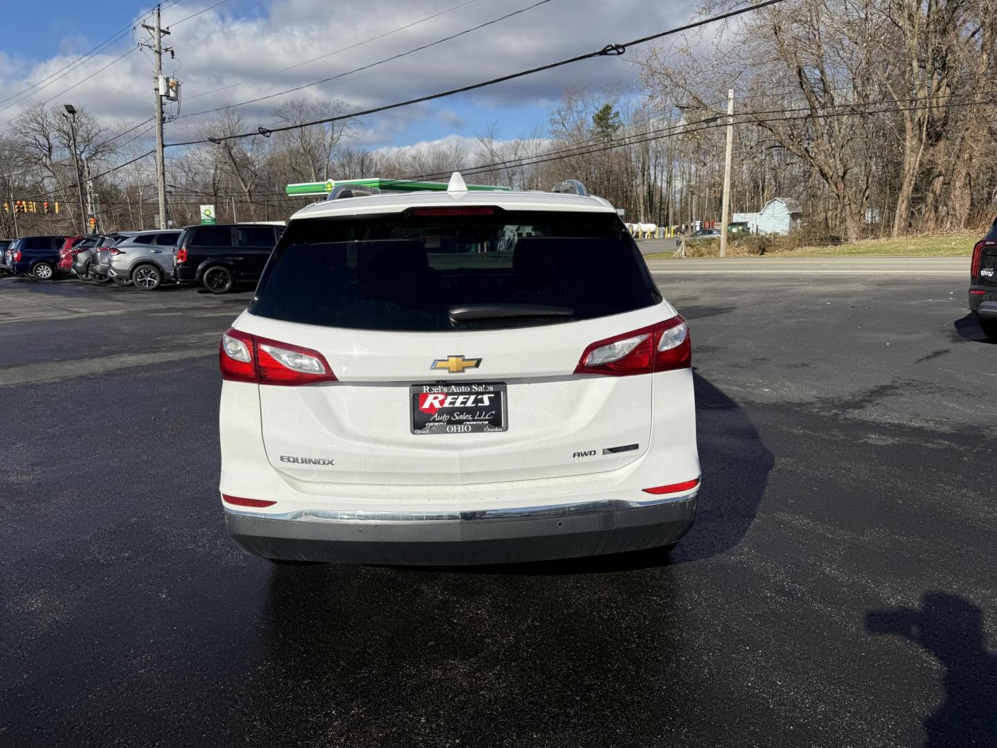 2018 White /Black Chevrolet Equinox Premier AWD (3GNAXVEVXJL) with an 1.5L I4 DIR DOHC 16V TURBO engine, Automatic transmission, located at 11115 Chardon Rd. , Chardon, OH, 44024, (440) 214-9705, 41.580246, -81.241943 - One Owner --- 2018 Chevrolet Equinox Premier AWD – Luxurious Comfort, Advanced Safety, and Unmatched Efficiency Experience the perfect combination of style, safety, and technology with this 2018 Chevrolet Equinox Premier AWD. Powered by a fuel-efficient 1.5L Turbocharged EcoTec I4 engine paired - Photo#8