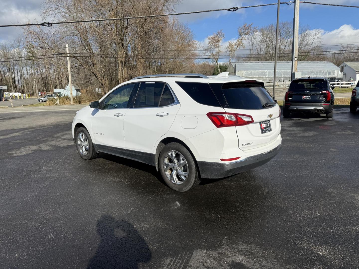 2018 White /Black Chevrolet Equinox Premier AWD (3GNAXVEVXJL) with an 1.5L I4 DIR DOHC 16V TURBO engine, Automatic transmission, located at 11115 Chardon Rd. , Chardon, OH, 44024, (440) 214-9705, 41.580246, -81.241943 - One Owner --- 2018 Chevrolet Equinox Premier AWD – Luxurious Comfort, Advanced Safety, and Unmatched Efficiency Experience the perfect combination of style, safety, and technology with this 2018 Chevrolet Equinox Premier AWD. Powered by a fuel-efficient 1.5L Turbocharged EcoTec I4 engine paired - Photo#9