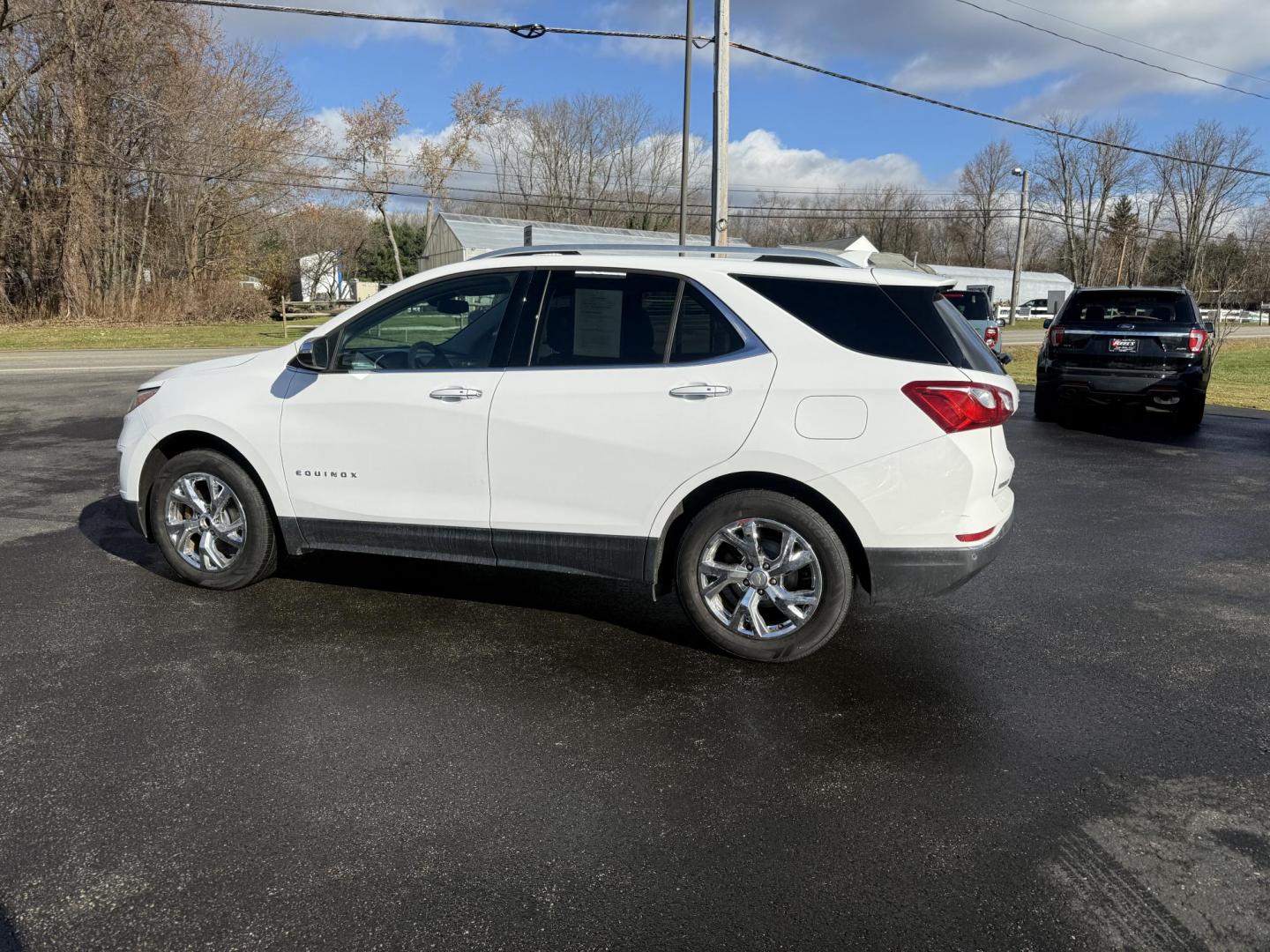 2018 White /Black Chevrolet Equinox Premier AWD (3GNAXVEVXJL) with an 1.5L I4 DIR DOHC 16V TURBO engine, Automatic transmission, located at 11115 Chardon Rd. , Chardon, OH, 44024, (440) 214-9705, 41.580246, -81.241943 - One Owner --- 2018 Chevrolet Equinox Premier AWD – Luxurious Comfort, Advanced Safety, and Unmatched Efficiency Experience the perfect combination of style, safety, and technology with this 2018 Chevrolet Equinox Premier AWD. Powered by a fuel-efficient 1.5L Turbocharged EcoTec I4 engine paired - Photo#10