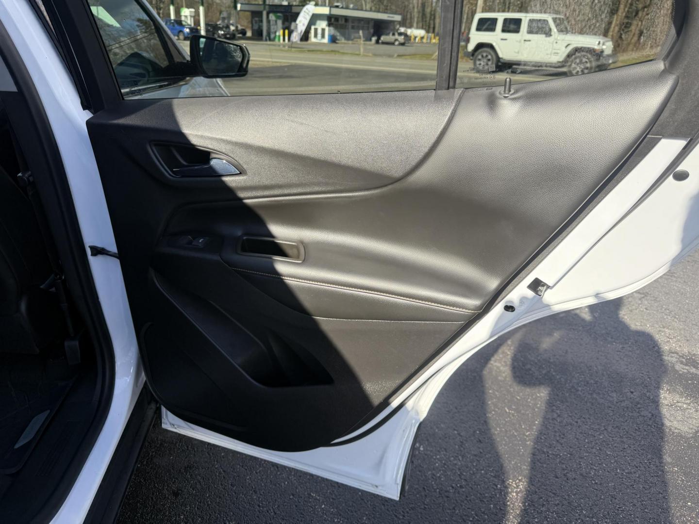 2018 White /Black Chevrolet Equinox Premier AWD (3GNAXVEVXJL) with an 1.5L I4 DIR DOHC 16V TURBO engine, Automatic transmission, located at 11115 Chardon Rd. , Chardon, OH, 44024, (440) 214-9705, 41.580246, -81.241943 - One Owner --- 2018 Chevrolet Equinox Premier AWD – Luxurious Comfort, Advanced Safety, and Unmatched Efficiency Experience the perfect combination of style, safety, and technology with this 2018 Chevrolet Equinox Premier AWD. Powered by a fuel-efficient 1.5L Turbocharged EcoTec I4 engine paired - Photo#48