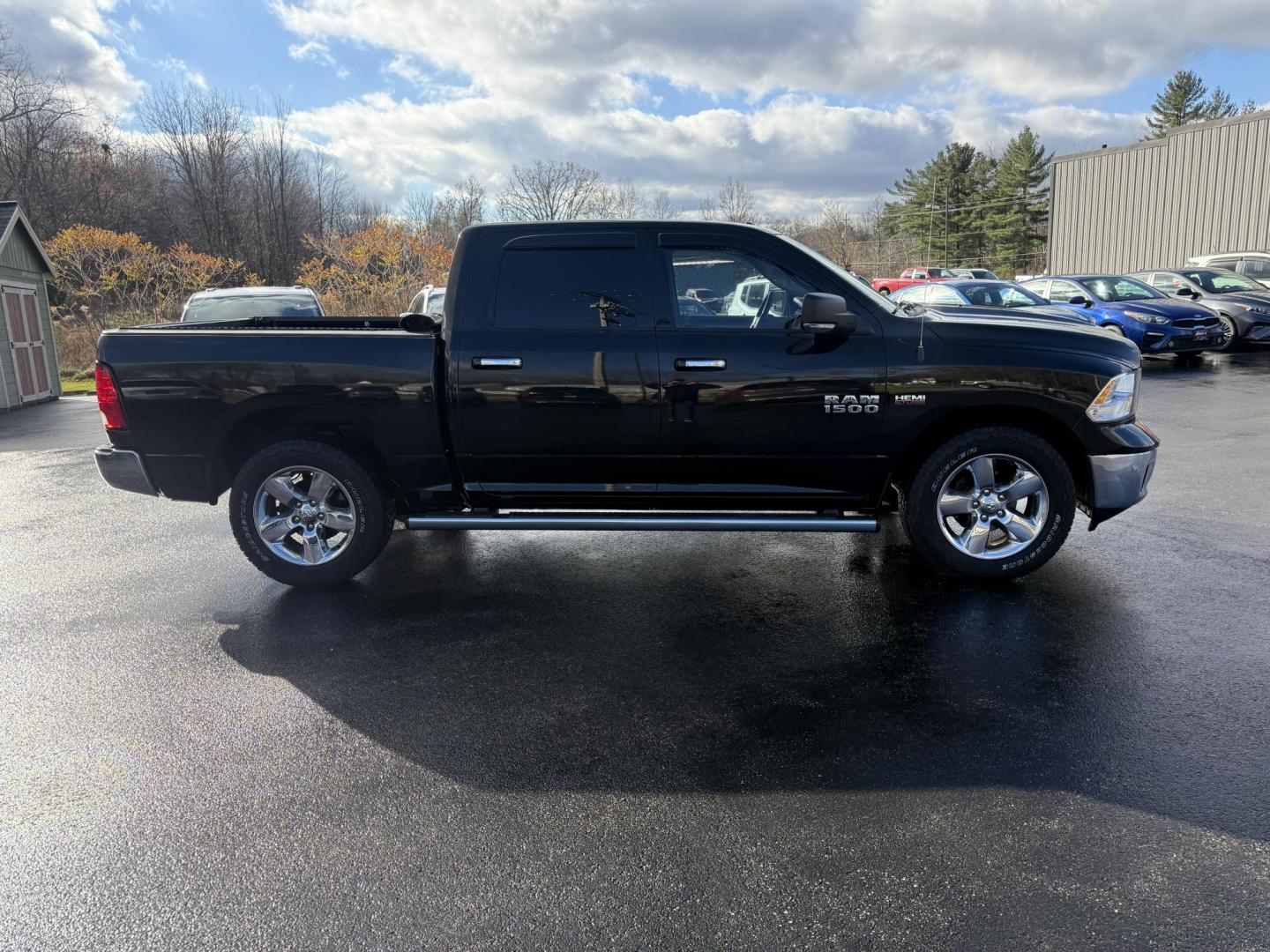 2016 Black /Gray RAM 1500 Big Horn Crew Cab SWB 4WD (3C6RR7LT8GG) with an 5.7L V8 OHV 16V engine, Automatic transmission, located at 11115 Chardon Rd. , Chardon, OH, 44024, (440) 214-9705, 41.580246, -81.241943 - 2016 Ram 1500 Big Horn Crew Cab 4WD – Powerful, Comfortable, and Ready for Heavy Duty Tackle your toughest jobs with confidence in this 2016 Ram 1500 Big Horn Crew Cab. Powered by a mighty 5.7L HEMI V8 engine producing 395 horsepower and 410 lb-ft of torque, combined with an 8-speed automatic t - Photo#7