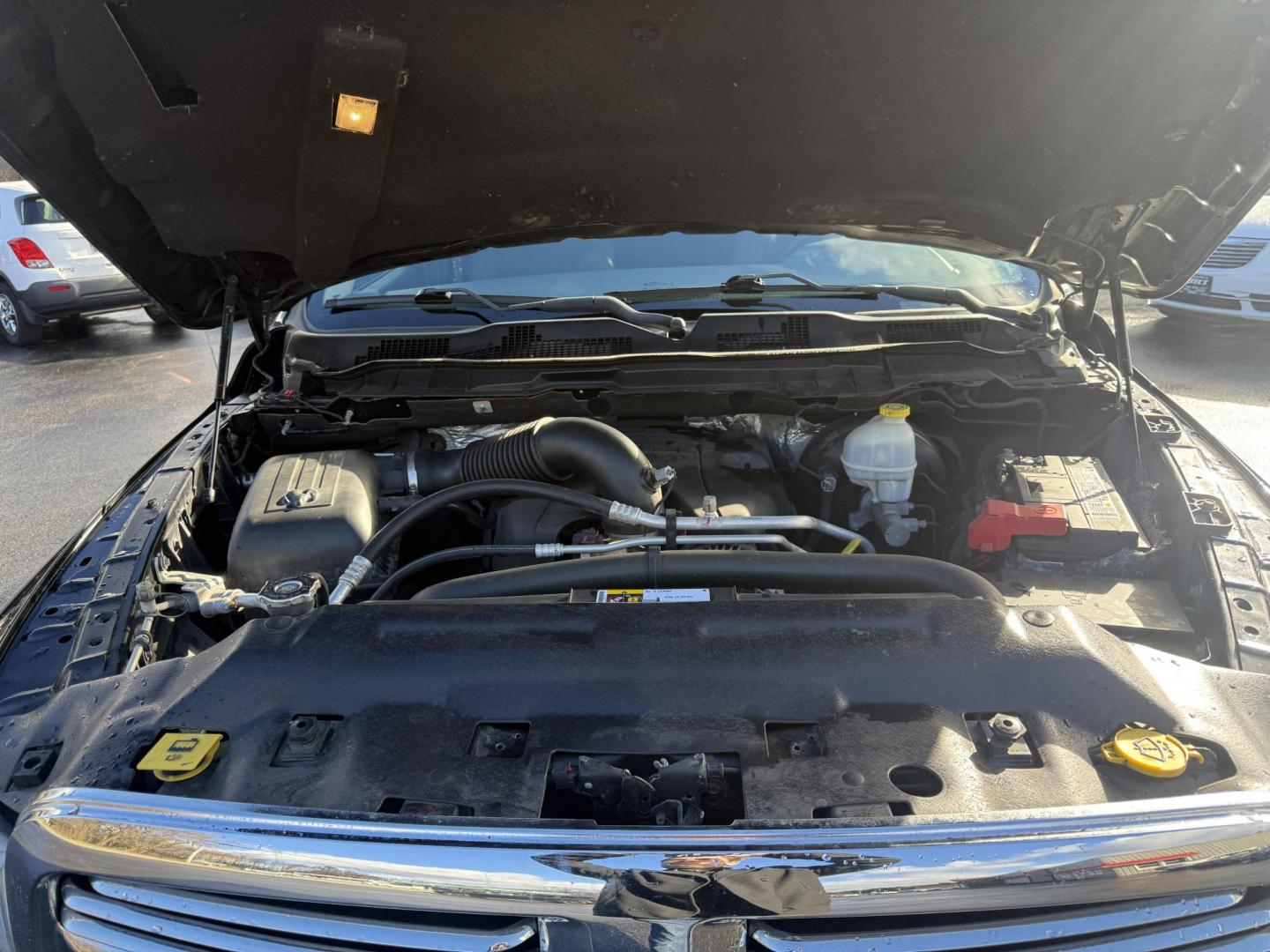 2016 Black /Gray RAM 1500 Big Horn Crew Cab SWB 4WD (3C6RR7LT8GG) with an 5.7L V8 OHV 16V engine, Automatic transmission, located at 11115 Chardon Rd. , Chardon, OH, 44024, (440) 214-9705, 41.580246, -81.241943 - 2016 Ram 1500 Big Horn Crew Cab 4WD – Powerful, Comfortable, and Ready for Heavy Duty Tackle your toughest jobs with confidence in this 2016 Ram 1500 Big Horn Crew Cab. Powered by a mighty 5.7L HEMI V8 engine producing 395 horsepower and 410 lb-ft of torque, combined with an 8-speed automatic t - Photo#17