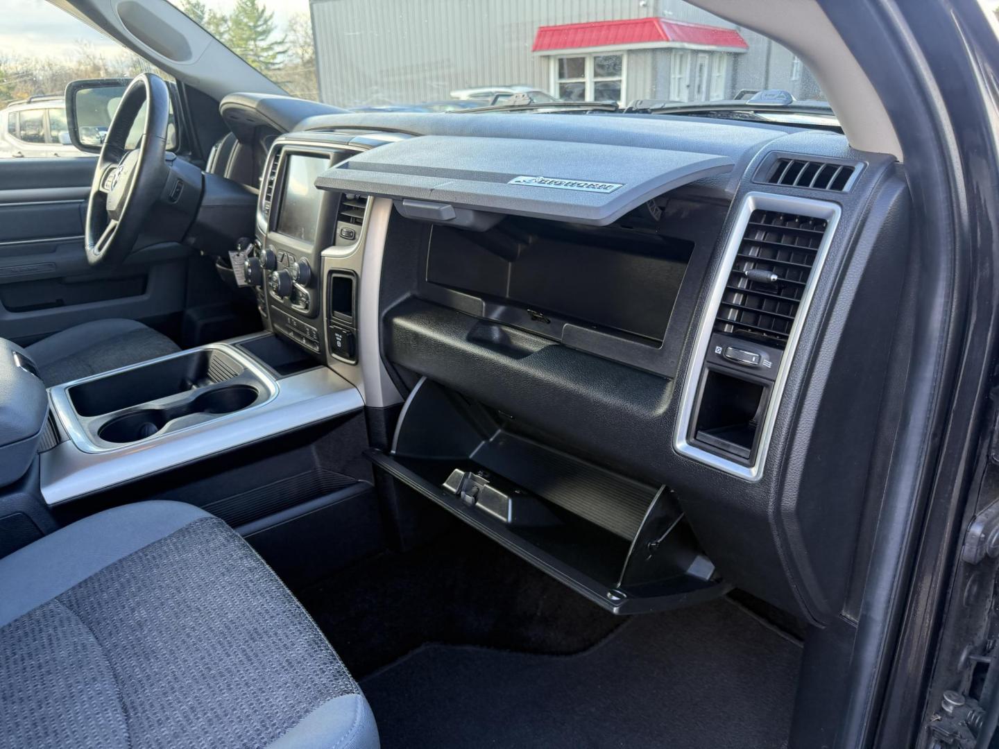 2016 Black /Gray RAM 1500 Big Horn Crew Cab SWB 4WD (3C6RR7LT8GG) with an 5.7L V8 OHV 16V engine, Automatic transmission, located at 11115 Chardon Rd. , Chardon, OH, 44024, (440) 214-9705, 41.580246, -81.241943 - 2016 Ram 1500 Big Horn Crew Cab 4WD – Powerful, Comfortable, and Ready for Heavy Duty Tackle your toughest jobs with confidence in this 2016 Ram 1500 Big Horn Crew Cab. Powered by a mighty 5.7L HEMI V8 engine producing 395 horsepower and 410 lb-ft of torque, combined with an 8-speed automatic t - Photo#47