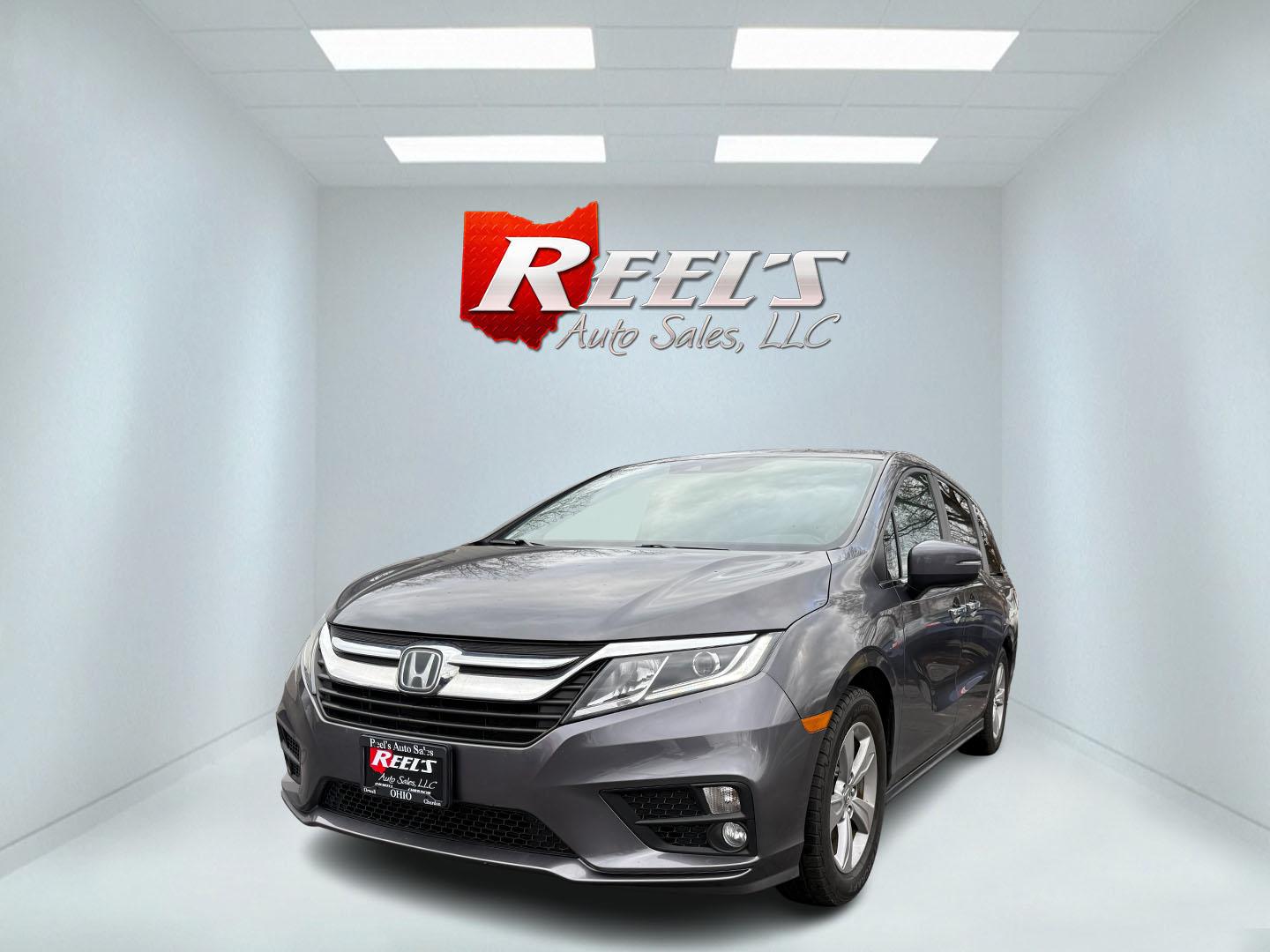 2019 Gray /Gray Honda Odyssey EX-L (5FNRL6H73KB) with an 3.5L V6 SOHC 24V engine, Automatic transmission, located at 547 E. Main St., Orwell, OH, 44076, (440) 437-5893, 41.535435, -80.847855 - One Owner --- 2019 Honda Odyssey EX-L – Luxurious Family Hauler with Advanced Safety and Comfort Experience the perfect blend of space, comfort, and technology with this 2019 Honda Odyssey EX-L. Powered by a smooth and efficient 3.5L EarthDreams V6 engine paired with a 9-speed automatic transmi - Photo#0