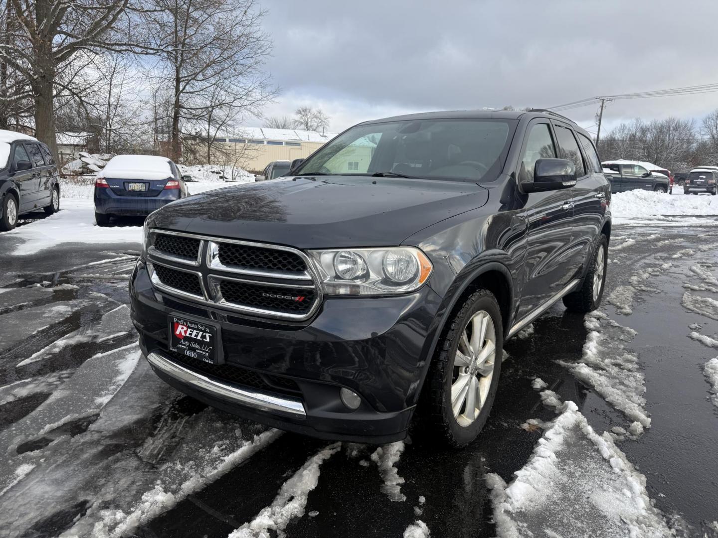 2013 Gray /Black Dodge Durango Crew AWD (1C4SDJDT9DC) with an 5.7L V8 OHV 16V engine, 5-Speed Automatic transmission, located at 547 E. Main St., Orwell, OH, 44076, (440) 437-5893, 41.535435, -80.847855 - 2013 Dodge Durango Crew AWD – Powerful Performance, Family Comfort, and Versatile Capability Take on every adventure in style with this 2013 Dodge Durango Crew AWD. Featuring a robust 5.7L HEMI V8 engine and a 5-speed automatic transmission, this SUV delivers impressive power and a 7,200-pound - Photo#0