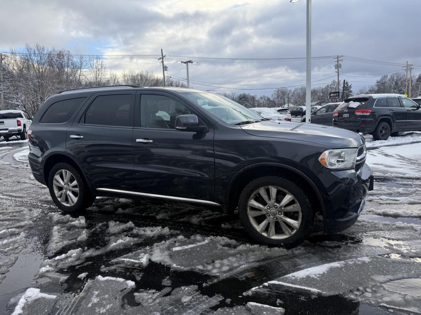 2013 Gray /Black Dodge Durango Crew AWD (1C4SDJDT9DC) with an 5.7L V8 OHV 16V engine, 5-Speed Automatic transmission, located at 547 E. Main St., Orwell, OH, 44076, (440) 437-5893, 41.535435, -80.847855 - 2013 Dodge Durango Crew AWD – Powerful Performance, Family Comfort, and Versatile Capability Take on every adventure in style with this 2013 Dodge Durango Crew AWD. Featuring a robust 5.7L HEMI V8 engine and a 5-speed automatic transmission, this SUV delivers impressive power and a 7,200-pound - Photo#3