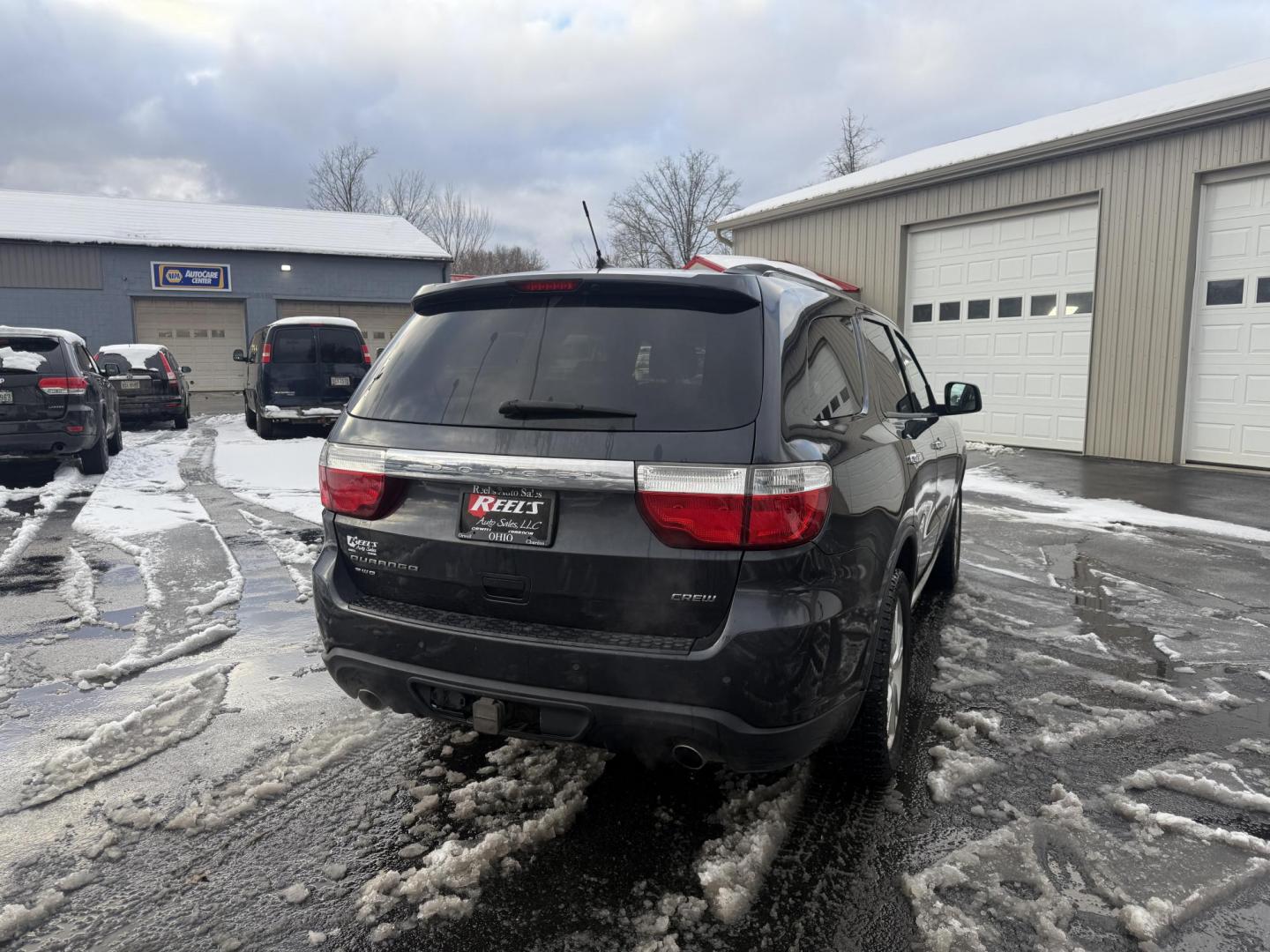 2013 Gray /Black Dodge Durango Crew AWD (1C4SDJDT9DC) with an 5.7L V8 OHV 16V engine, 5-Speed Automatic transmission, located at 547 E. Main St., Orwell, OH, 44076, (440) 437-5893, 41.535435, -80.847855 - 2013 Dodge Durango Crew AWD – Powerful Performance, Family Comfort, and Versatile Capability Take on every adventure in style with this 2013 Dodge Durango Crew AWD. Featuring a robust 5.7L HEMI V8 engine and a 5-speed automatic transmission, this SUV delivers impressive power and a 7,200-pound - Photo#7