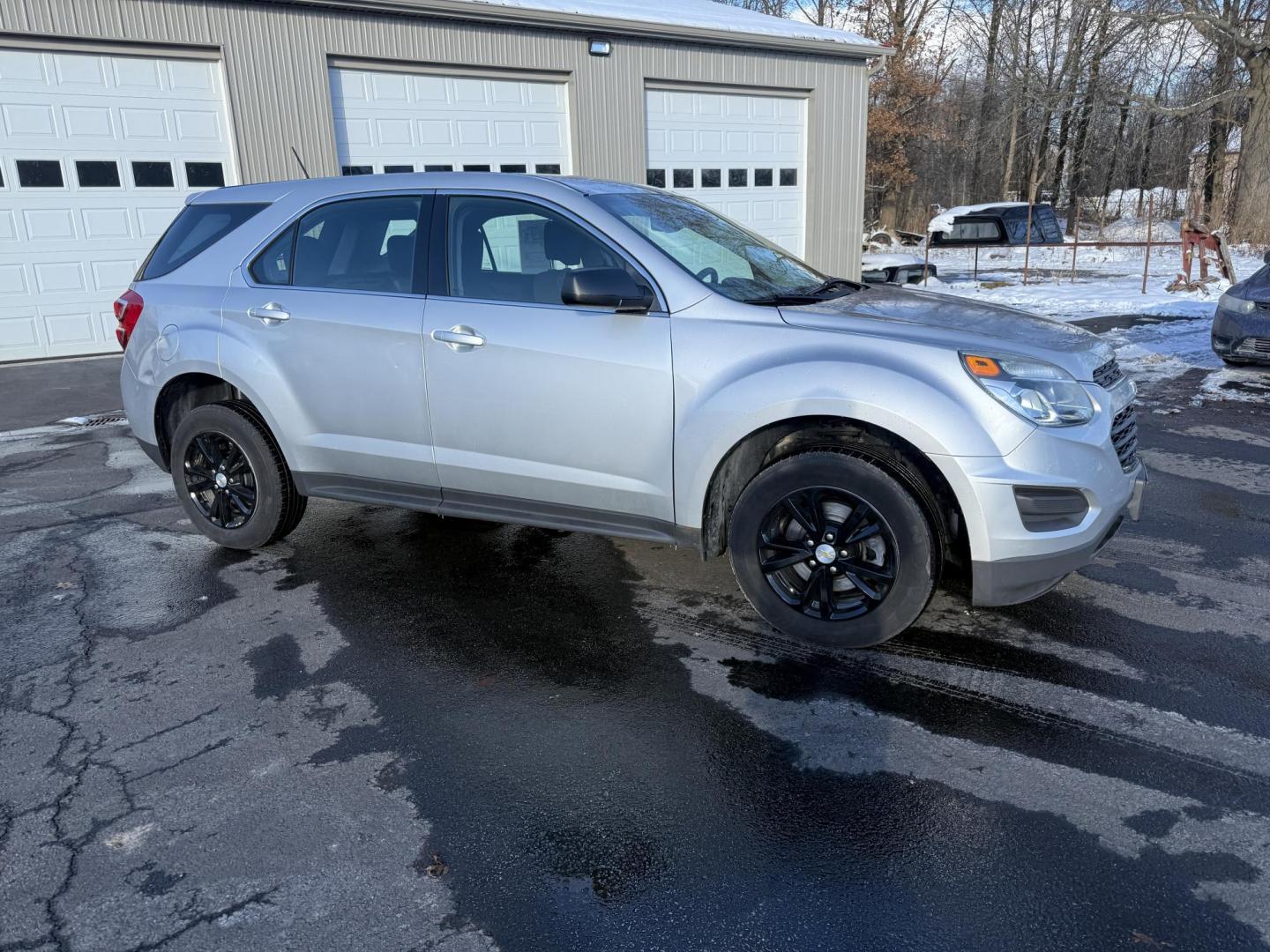 2017 Silver /Black Chevrolet Equinox LS AWD (2GNFLEEK5H6) with an 2.4L I4 DOHC 16V engine, Automatic transmission, located at 547 E. Main St., Orwell, OH, 44076, (440) 437-5893, 41.535435, -80.847855 - 2017 Chevrolet Equinox LS AWD – Efficiency, Comfort, and Everyday Reliability Enjoy the perfect balance of capability and economy with this 2017 Chevrolet Equinox LS AWD. Powered by a dependable 2.4L EcoTec I4 engine paired with a smooth 6-speed automatic transmission, this SUV delivers excelle - Photo#3