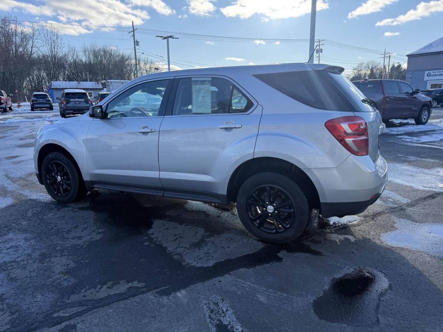 2017 Silver /Black Chevrolet Equinox LS AWD (2GNFLEEK5H6) with an 2.4L I4 DOHC 16V engine, Automatic transmission, located at 547 E. Main St., Orwell, OH, 44076, (440) 437-5893, 41.535435, -80.847855 - 2017 Chevrolet Equinox LS AWD – Efficiency, Comfort, and Everyday Reliability Enjoy the perfect balance of capability and economy with this 2017 Chevrolet Equinox LS AWD. Powered by a dependable 2.4L EcoTec I4 engine paired with a smooth 6-speed automatic transmission, this SUV delivers excelle - Photo#10