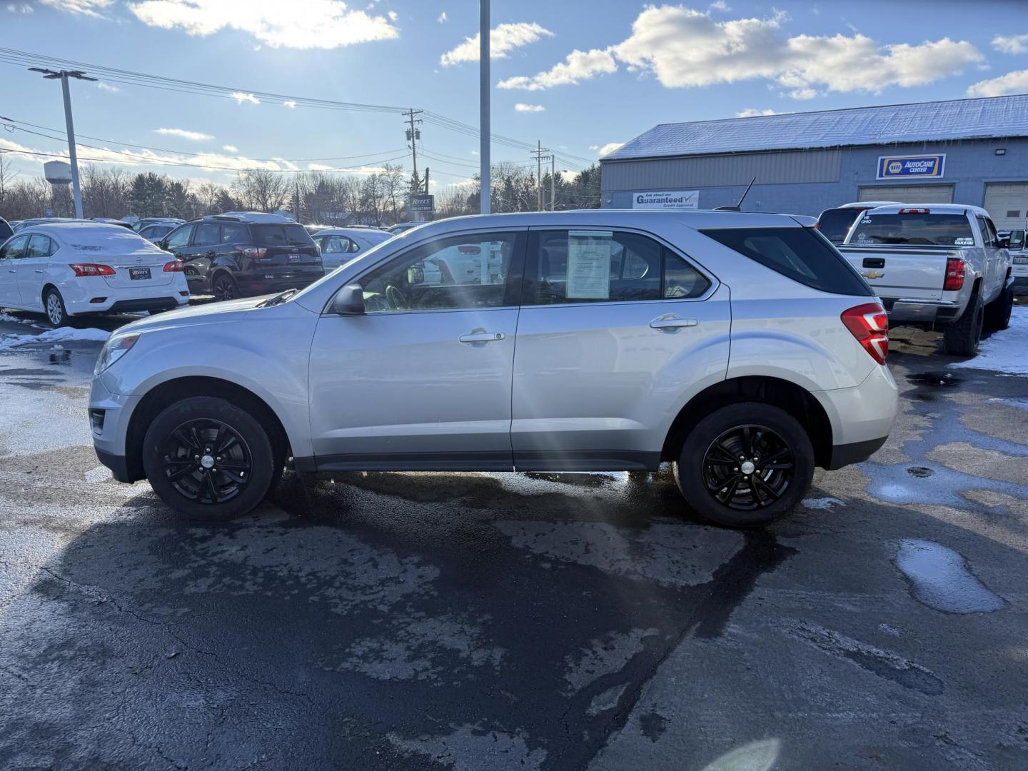 2017 Silver /Black Chevrolet Equinox LS AWD (2GNFLEEK5H6) with an 2.4L I4 DOHC 16V engine, Automatic transmission, located at 547 E. Main St., Orwell, OH, 44076, (440) 437-5893, 41.535435, -80.847855 - 2017 Chevrolet Equinox LS AWD – Efficiency, Comfort, and Everyday Reliability Enjoy the perfect balance of capability and economy with this 2017 Chevrolet Equinox LS AWD. Powered by a dependable 2.4L EcoTec I4 engine paired with a smooth 6-speed automatic transmission, this SUV delivers excelle - Photo#12