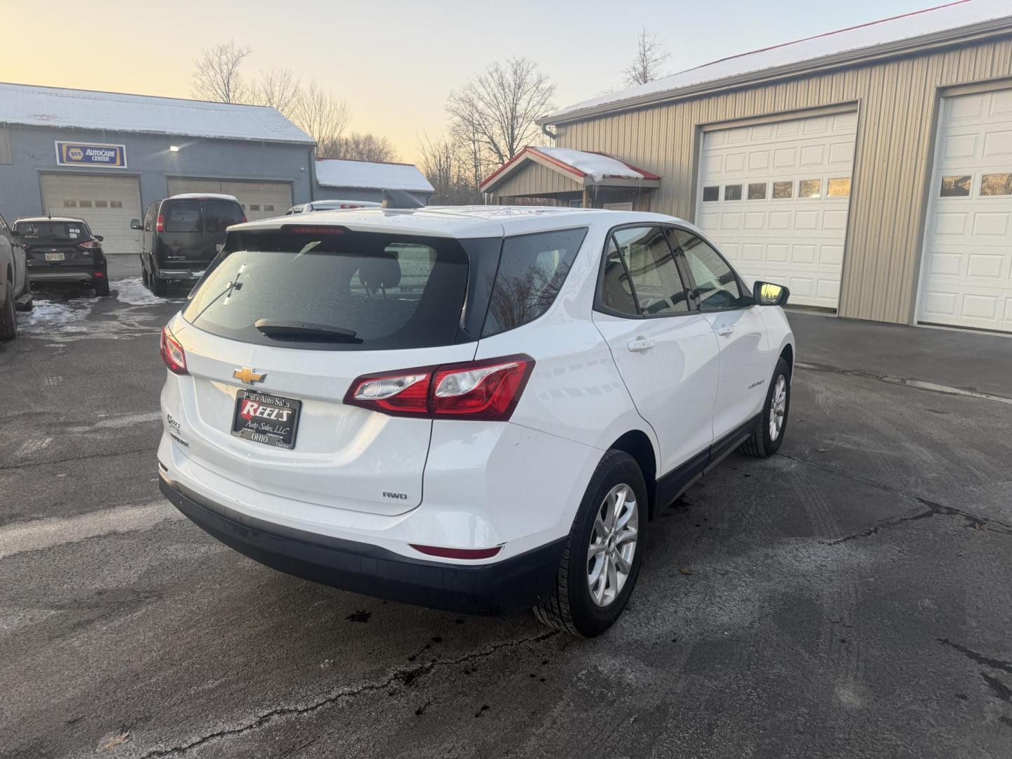 2019 White /White Chevrolet Equinox LS AWD (3GNAXSEV9KS) with an 1.5L I4 DOHC 16V TURBO engine, Automatic transmission, located at 547 E. Main St., Orwell, OH, 44076, (440) 437-5893, 41.535435, -80.847855 - One Owner ---- 2019 Chevrolet Equinox LS AWD – Efficient, Versatile, and Connected for Everyday Driving Enjoy the perfect blend of fuel efficiency, capability, and modern technology with this 2019 Chevrolet Equinox LS AWD. Featuring a responsive 1.5L Turbocharged EcoTec I4 engine paired with a - Photo#7