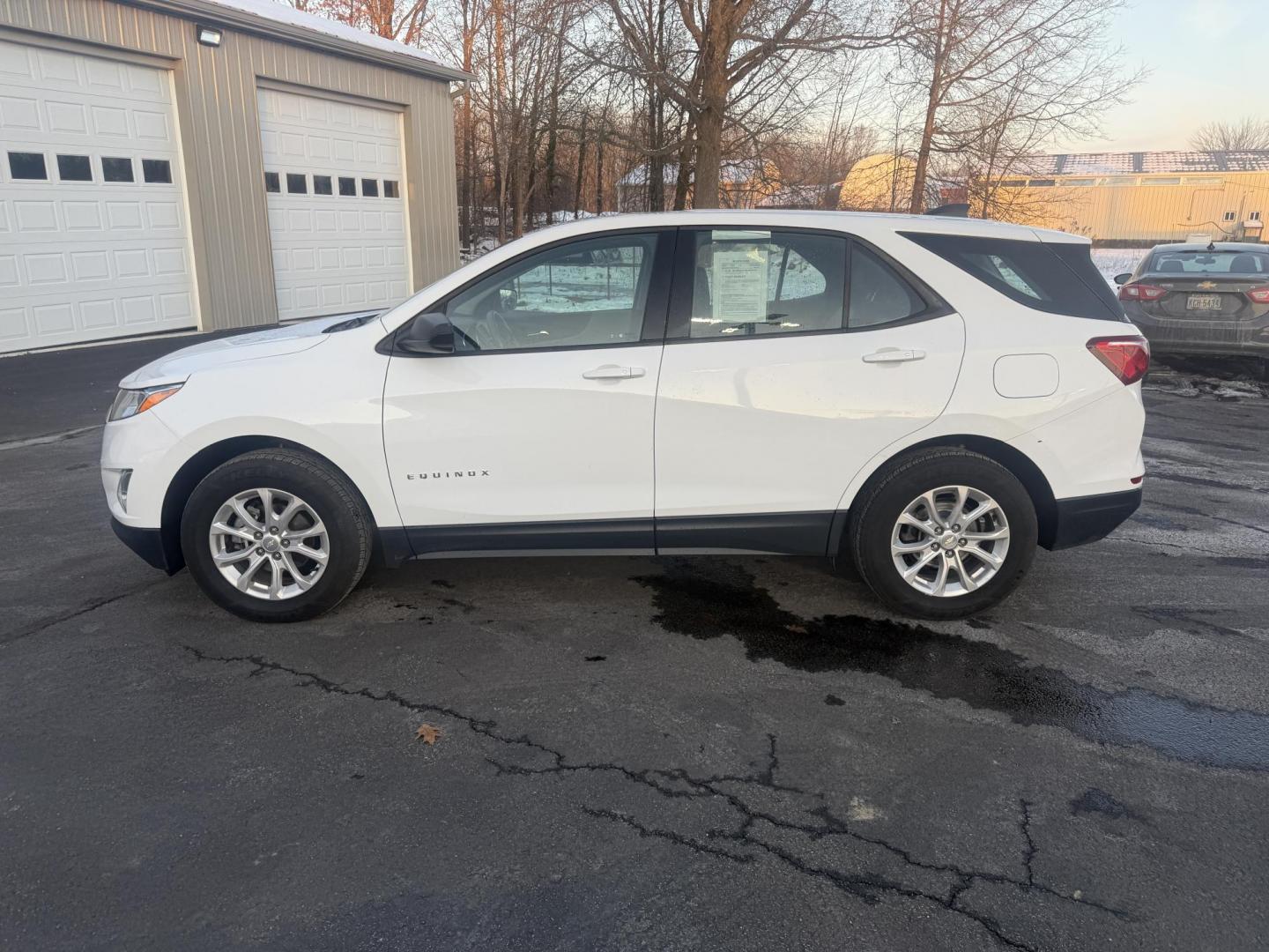 2019 White /White Chevrolet Equinox LS AWD (3GNAXSEV9KS) with an 1.5L I4 DOHC 16V TURBO engine, Automatic transmission, located at 547 E. Main St., Orwell, OH, 44076, (440) 437-5893, 41.535435, -80.847855 - One Owner ---- 2019 Chevrolet Equinox LS AWD – Efficient, Versatile, and Connected for Everyday Driving Enjoy the perfect blend of fuel efficiency, capability, and modern technology with this 2019 Chevrolet Equinox LS AWD. Featuring a responsive 1.5L Turbocharged EcoTec I4 engine paired with a - Photo#12
