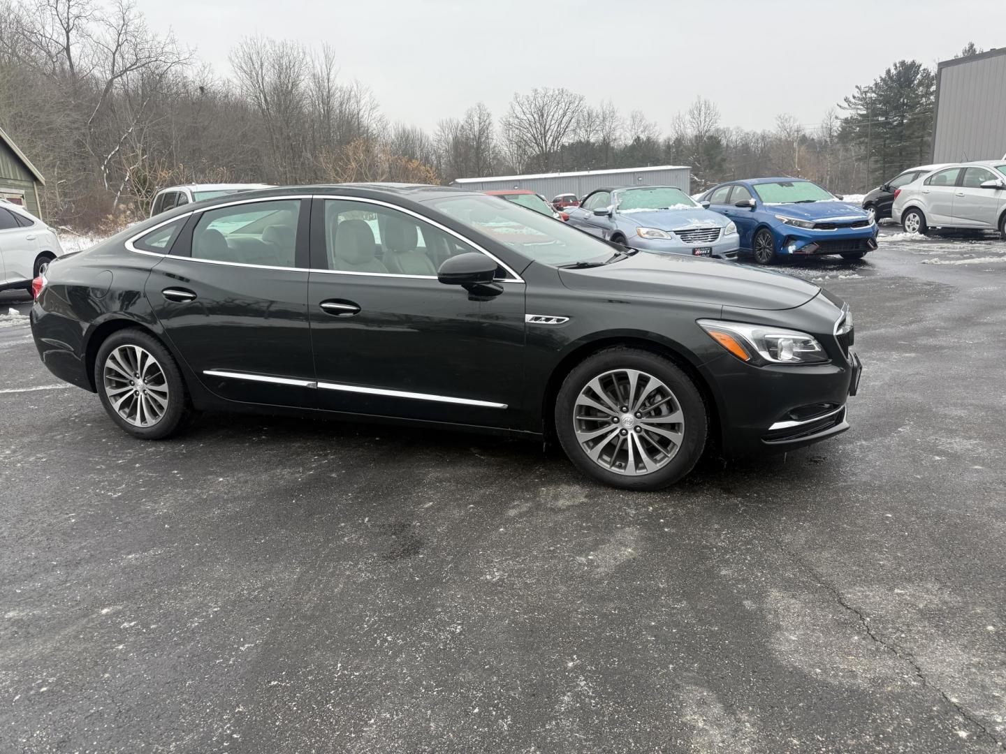 2017 Green /Tan Buick LaCrosse Premium (1G4ZR5SS9HU) with an 3.6L V6 DOHC 24V engine, Automatic transmission, located at 11115 Chardon Rd. , Chardon, OH, 44024, (440) 214-9705, 41.580246, -81.241943 - One Owner ---- 2017 Buick LaCrosse Premium – Luxurious Comfort, Cutting-Edge Technology, and Outstanding Efficiency Elevate your driving experience with this 2017 Buick LaCrosse Premium. Powered by a refined 3.6L V6 engine paired with an 8-speed automatic transmission, this sedan delivers impre - Photo#3