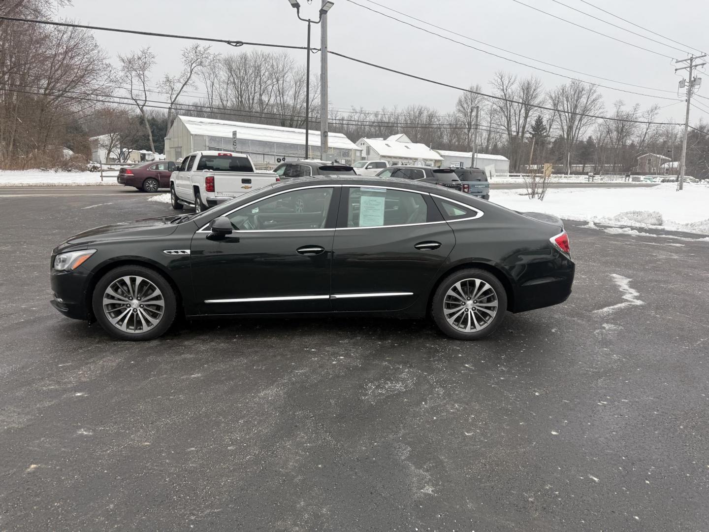 2017 Green /Tan Buick LaCrosse Premium (1G4ZR5SS9HU) with an 3.6L V6 DOHC 24V engine, Automatic transmission, located at 11115 Chardon Rd. , Chardon, OH, 44024, (440) 214-9705, 41.580246, -81.241943 - One Owner ---- 2017 Buick LaCrosse Premium – Luxurious Comfort, Cutting-Edge Technology, and Outstanding Efficiency Elevate your driving experience with this 2017 Buick LaCrosse Premium. Powered by a refined 3.6L V6 engine paired with an 8-speed automatic transmission, this sedan delivers impre - Photo#12