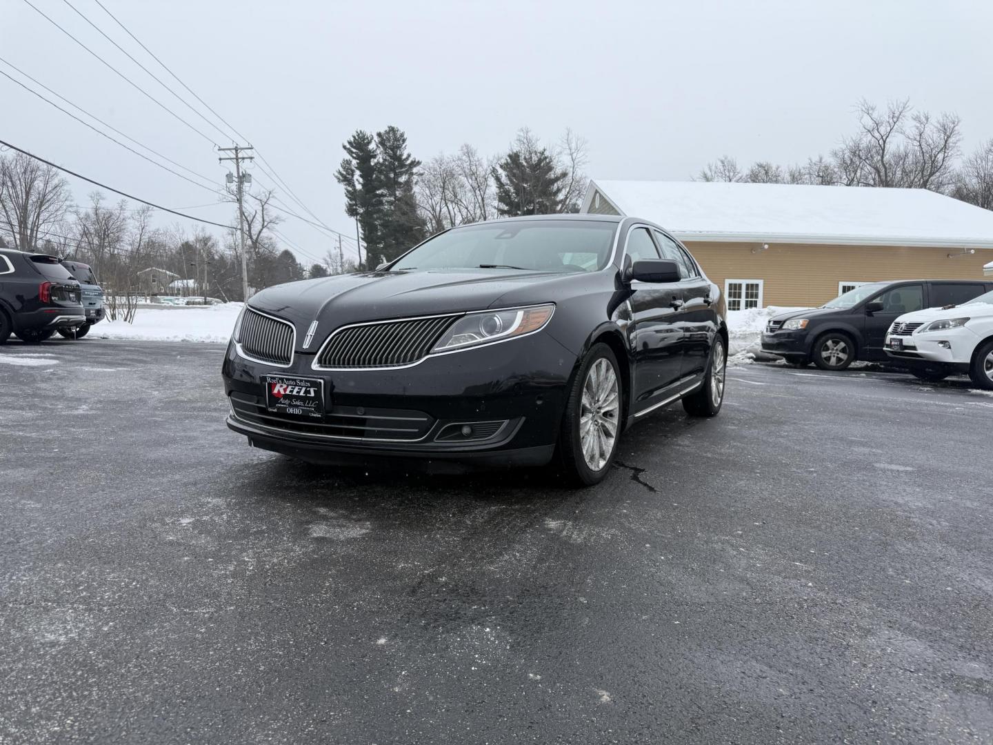 2016 Black /Black Lincoln MKS Elite EcoBoost AWD (1LNHL9FT6GG) with an 3.5L V6 DOHC 24V TWIN TURBO engine, Automatic transmission, located at 11115 Chardon Rd. , Chardon, OH, 44024, (440) 214-9705, 41.580246, -81.241943 - 2016 Lincoln MKS Elite AWD – Luxurious Performance, Cutting-Edge Technology, and Unmatched Comfort Experience the pinnacle of luxury and performance in this 2016 Lincoln MKS Elite AWD. Powered by a potent 3.5L Twin Turbo EcoBoost V6 engine paired with a smooth 6-speed automatic transmission, th - Photo#0